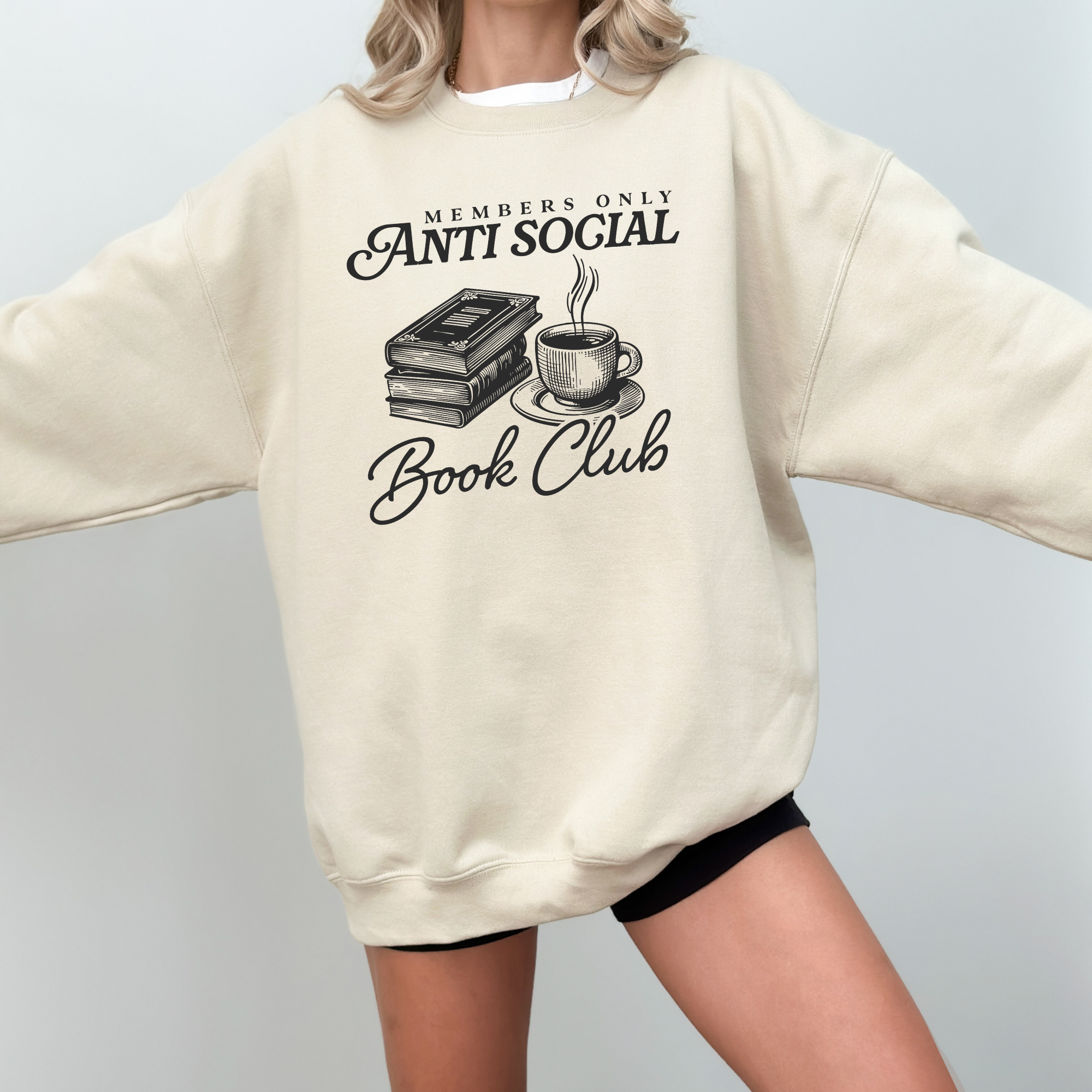 Pullover sweatshirt in the color sand that says "members only antisocial book club" for book lovers or bookish women.