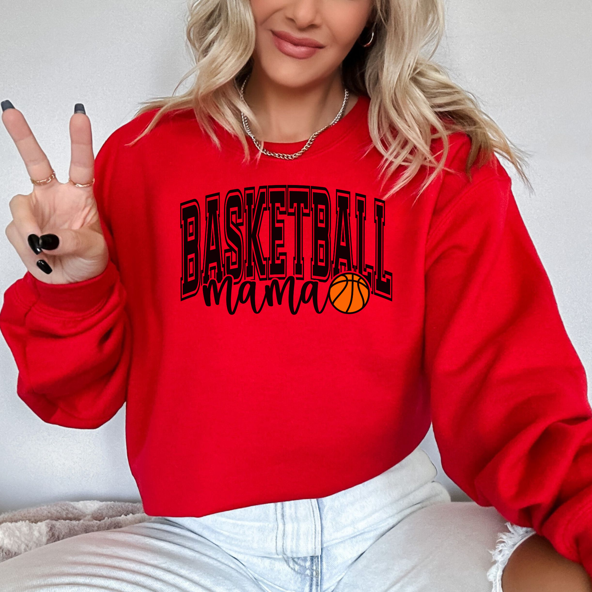 basketball mama sweatshirt with a college outline text , mama in cursive, and a small basketball