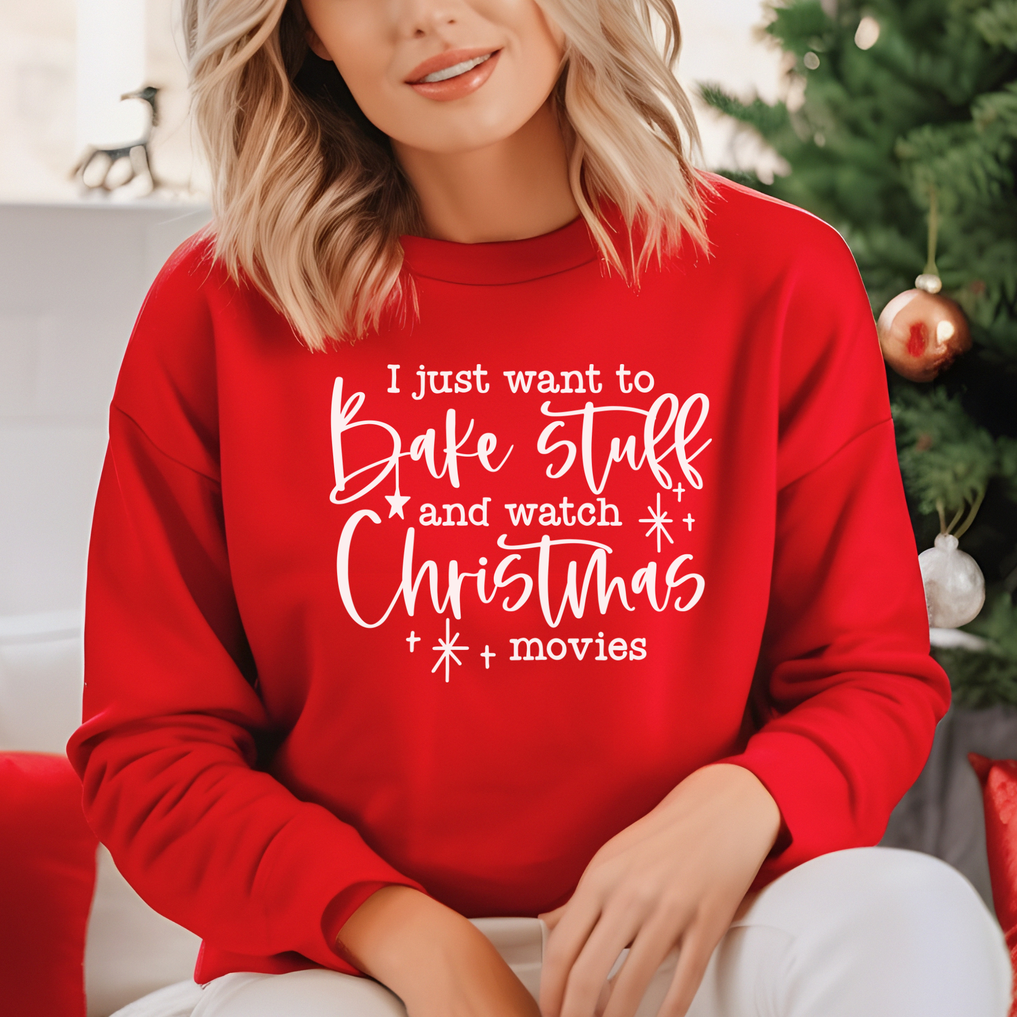 womens christmas sweatshirt that says I just want to bake stuff and watch christmas movies.
