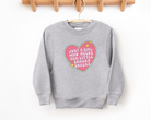 funny girls sweatshirt that says "just a girl who needs here little snacky snacks."