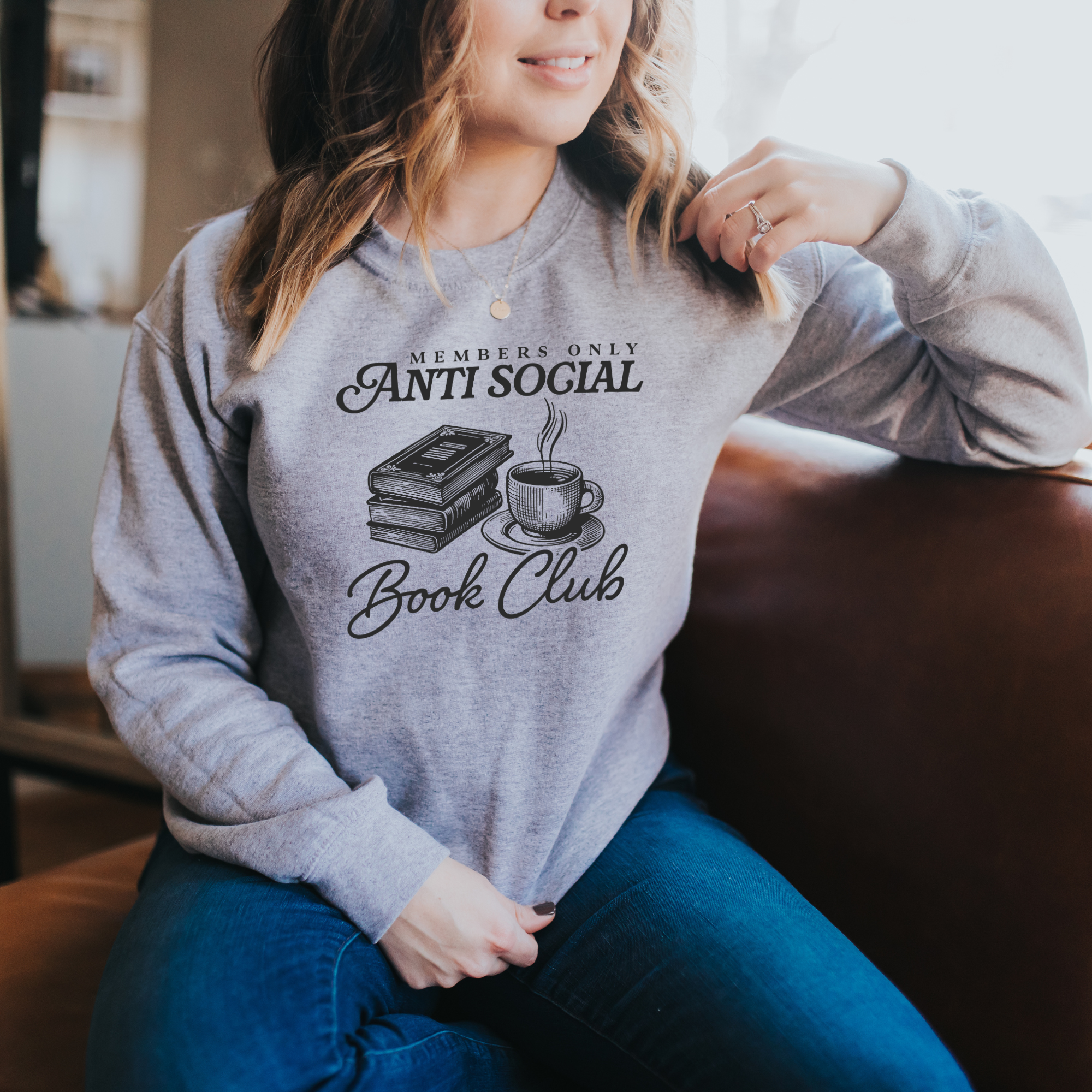 Pullover sweatshirt in the color sport gray that says "members only antisocial book club" for book lovers or bookish women.