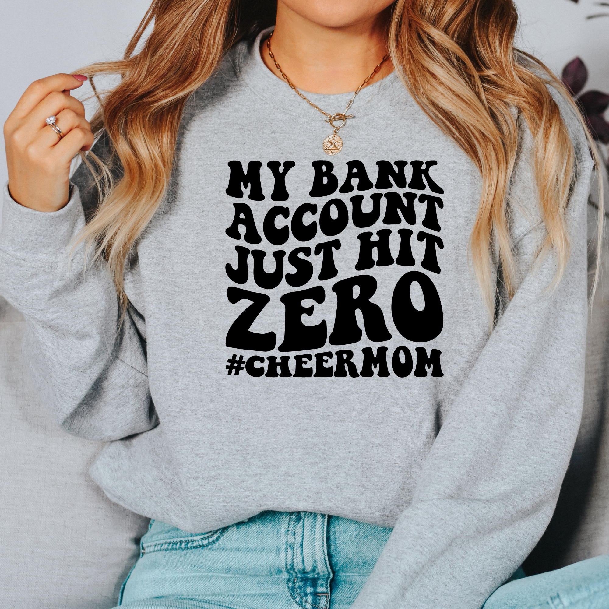 My bank account just hit zero cheer mom sweatshirt in gray.