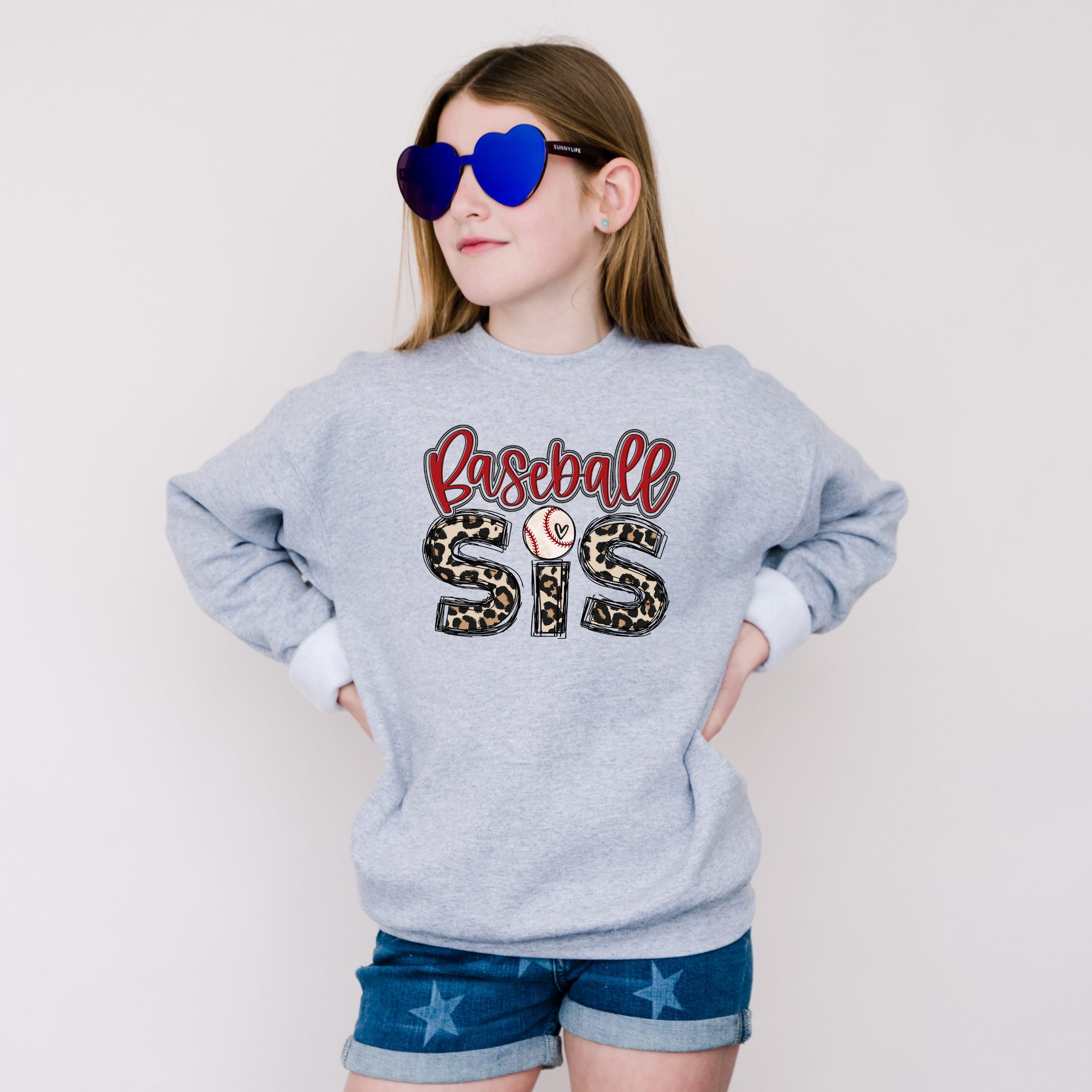 baseball sister sweatshirt with a leopard print design.
