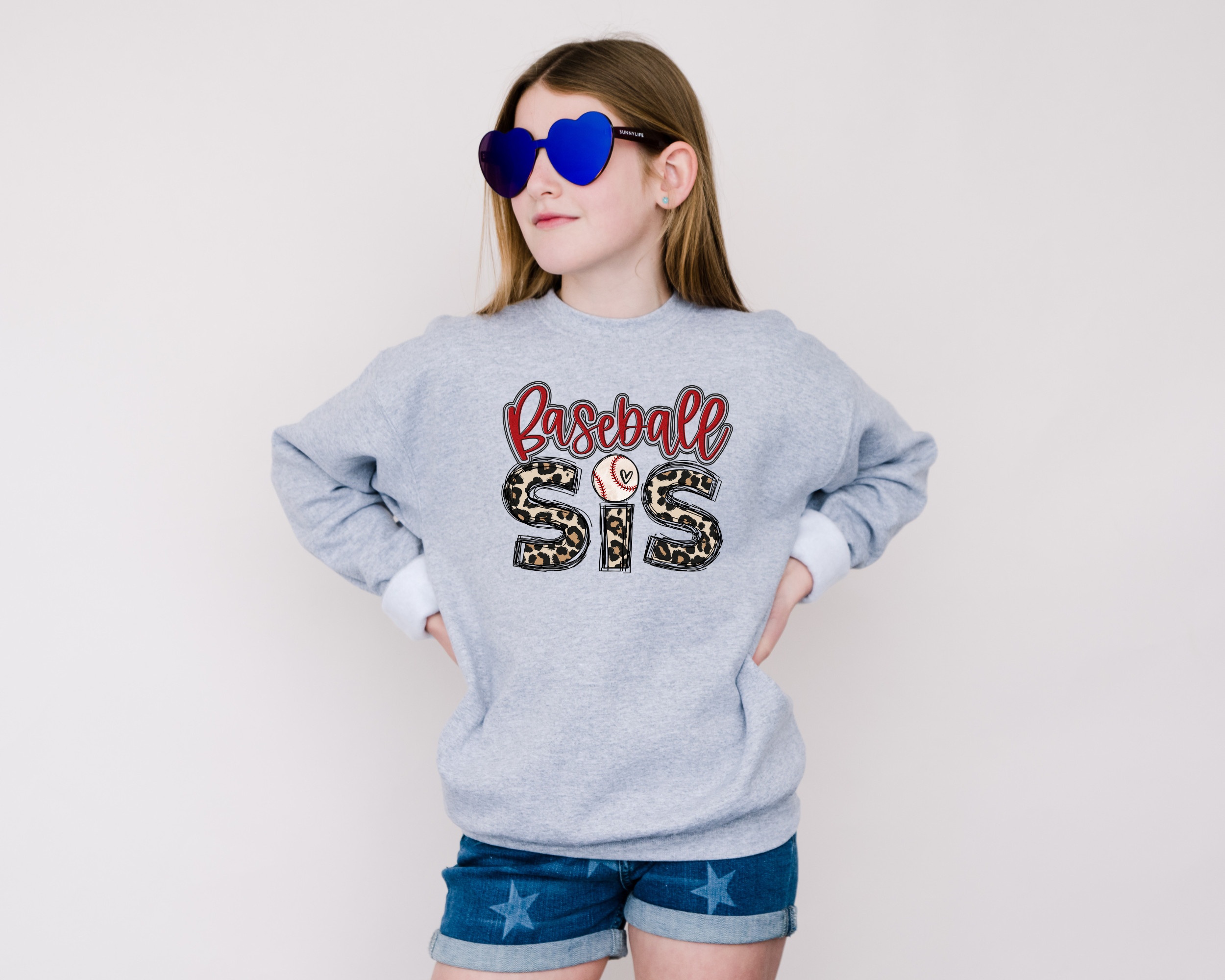 baseball sister sweatshirt with a leopard print design.