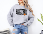 basketball mama sweatshirt with a college outline text , mama in cursive, and a small basketball