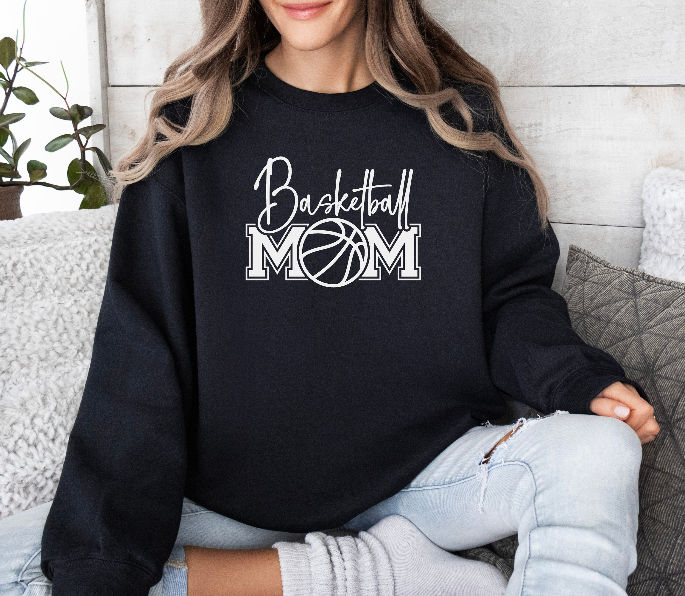 Basketball mom sweatshirt with a cute cursive font and a college text font. Great apparel for basketball games.
