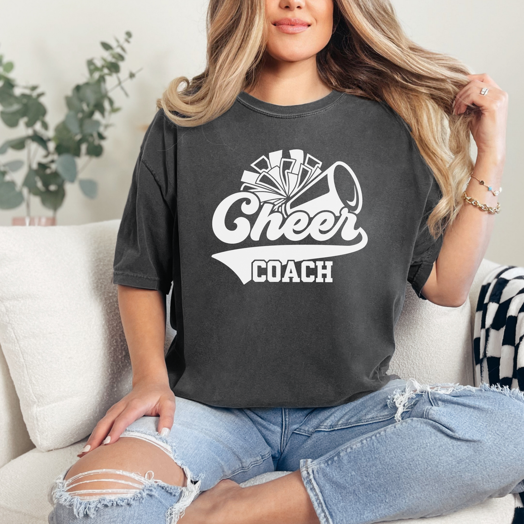 Retro cheer coach shirt with a pom pom and a megaphone.