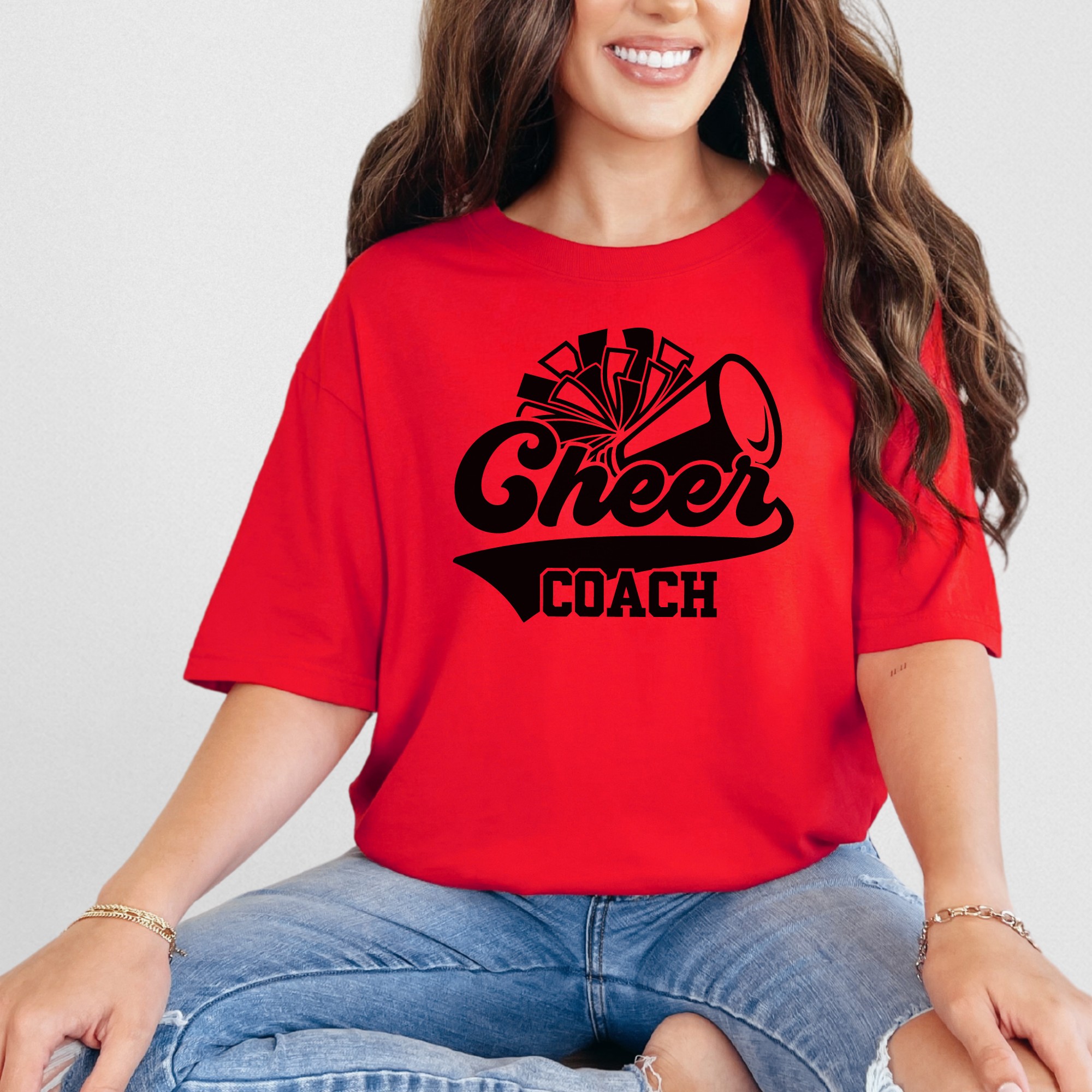 Retro cheer coach shirt with a pom pom and a megaphone.
