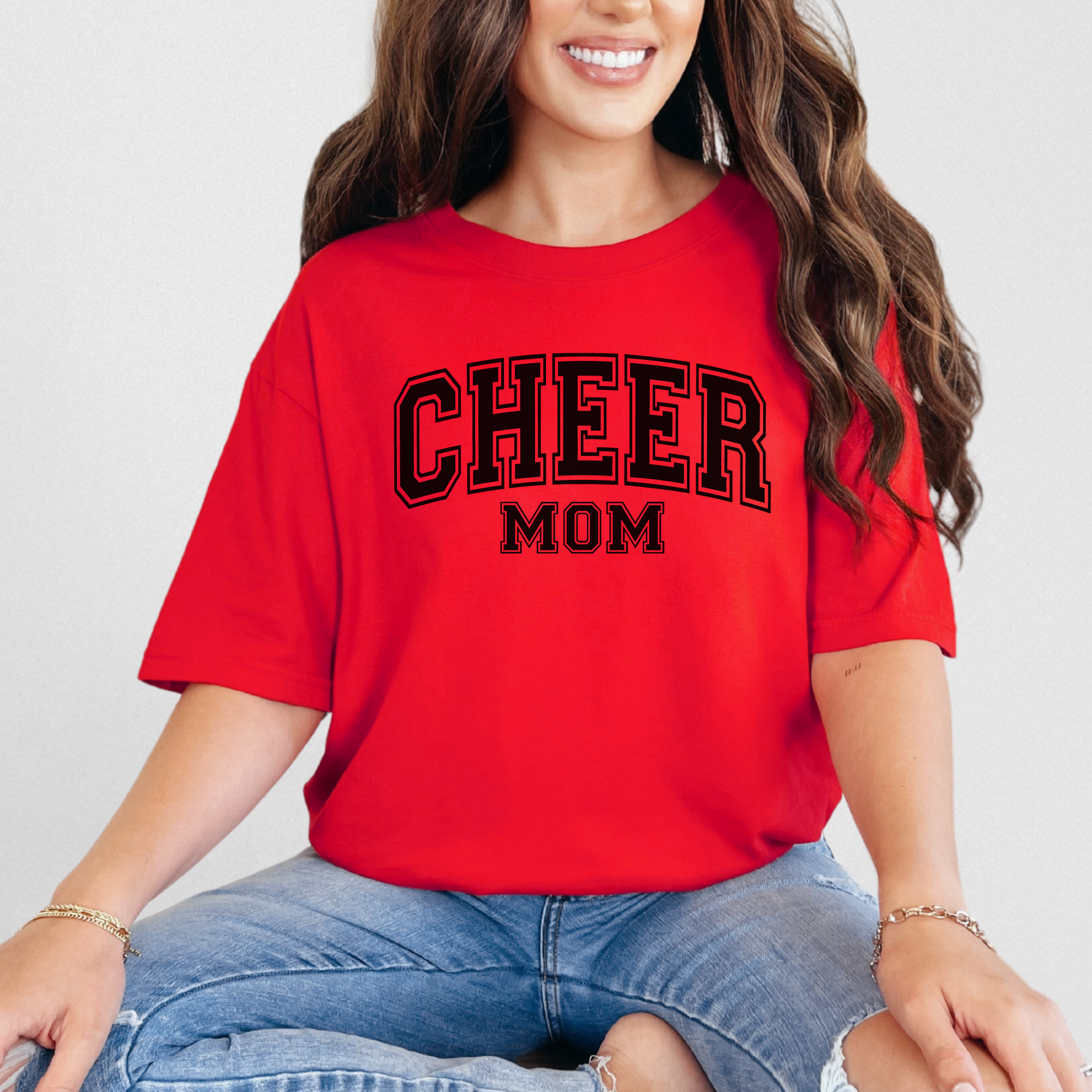 Cheer mom shirt in a college outline text in the color red