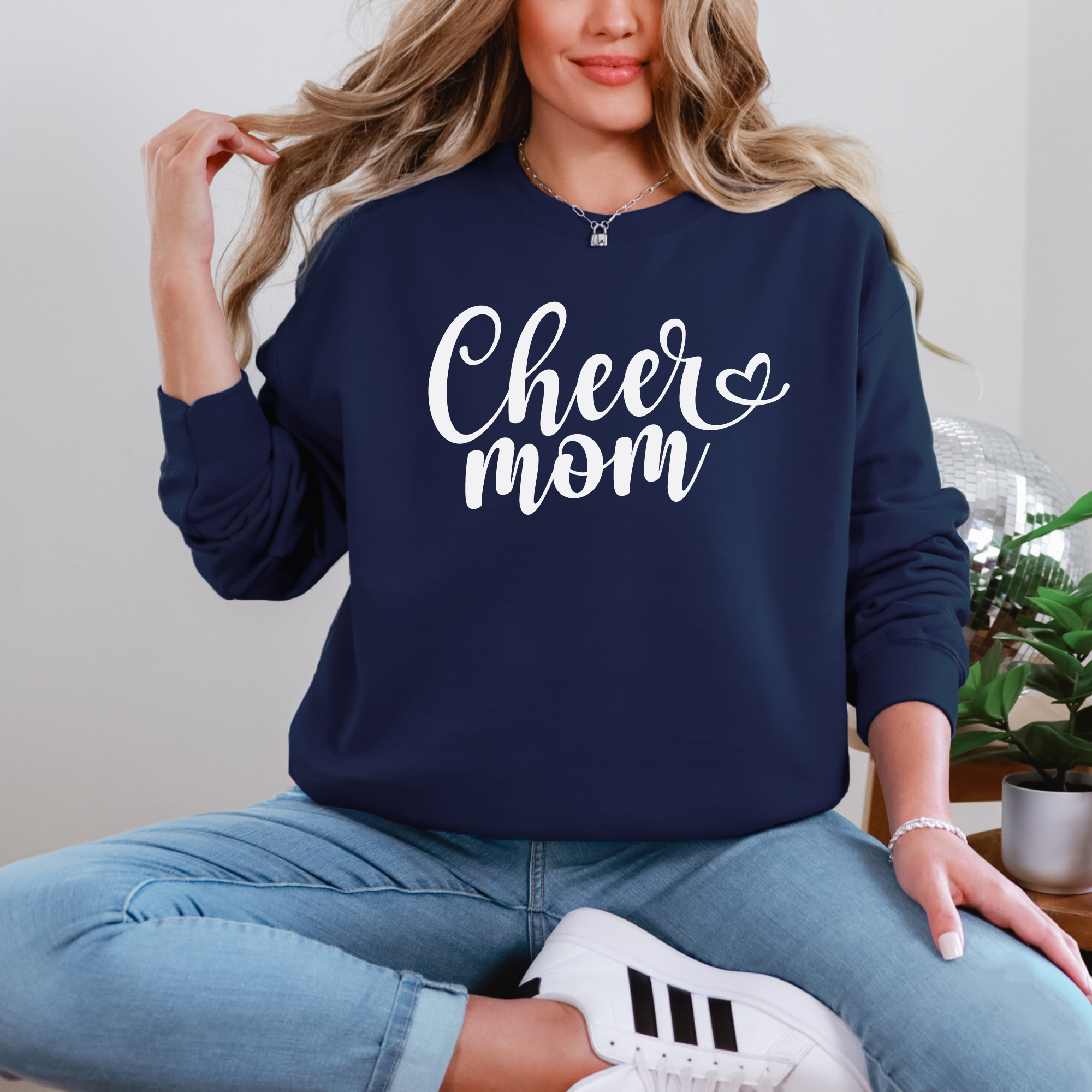 Cheer mom sweatshirt in a fun cursive font.