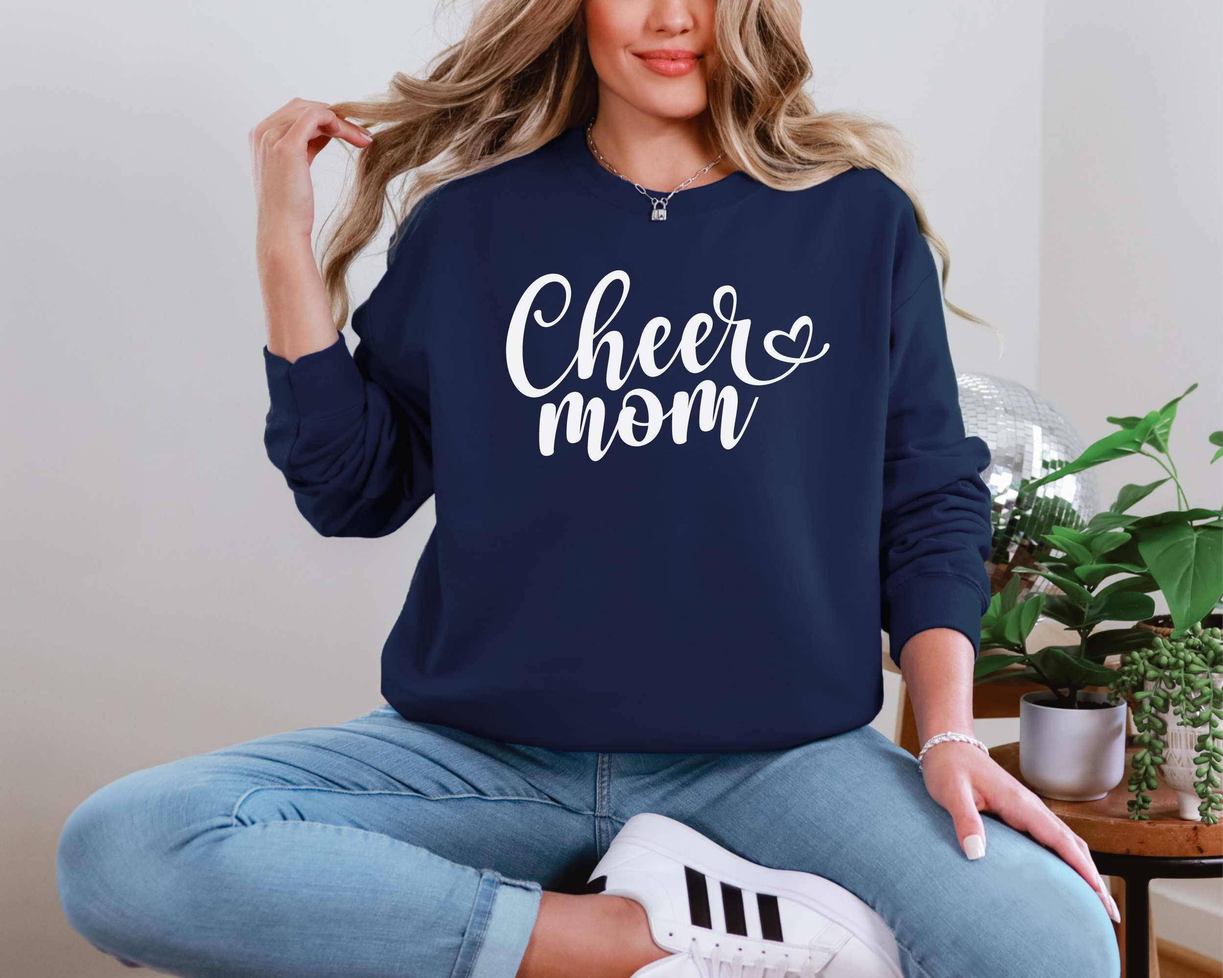 Cheer mom sweatshirt in a fun cursive font.