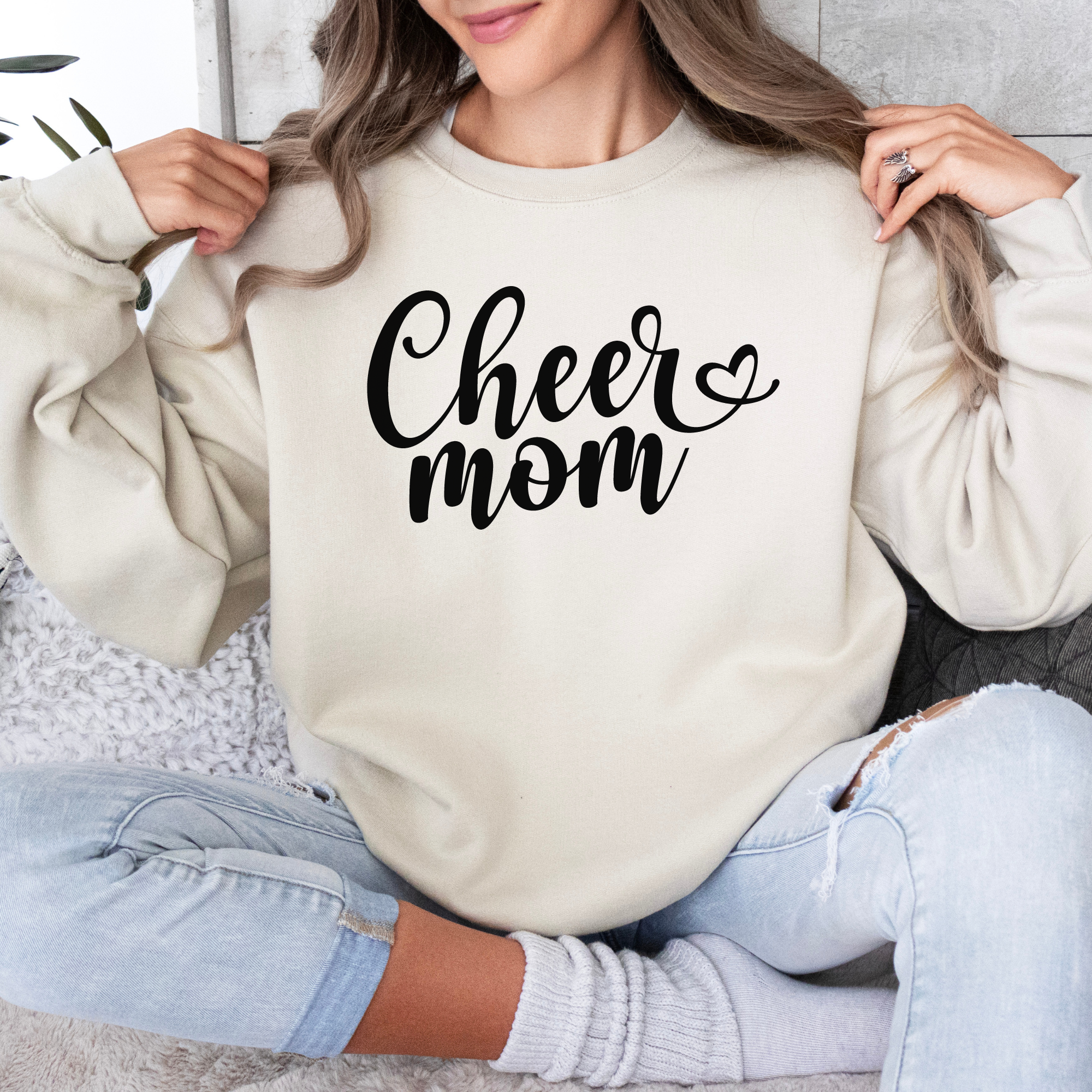 Cheer mom sweatshirt in a fun cursive font.
