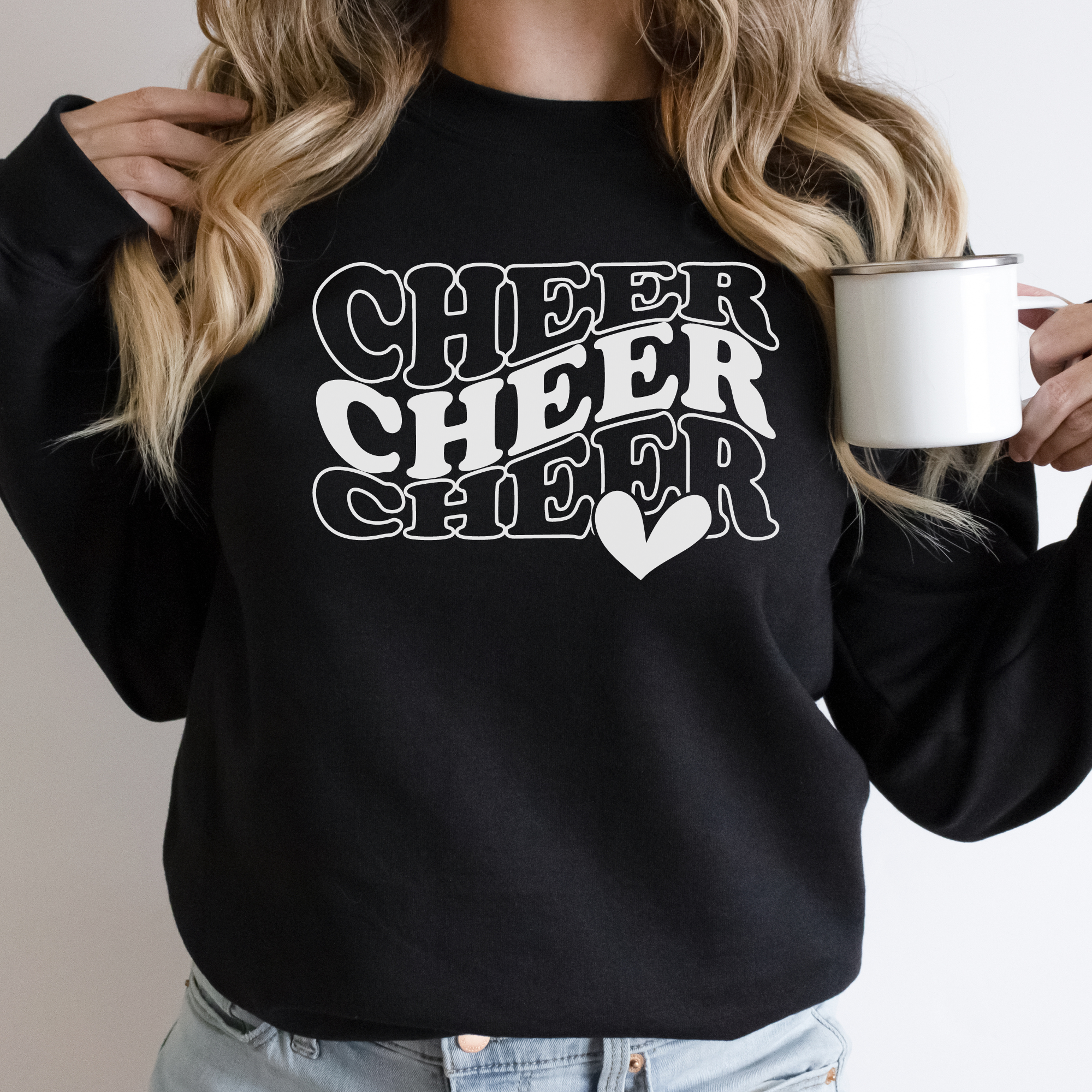 Black Cheer sweatshirt in in a wavy stacked text with a heart.