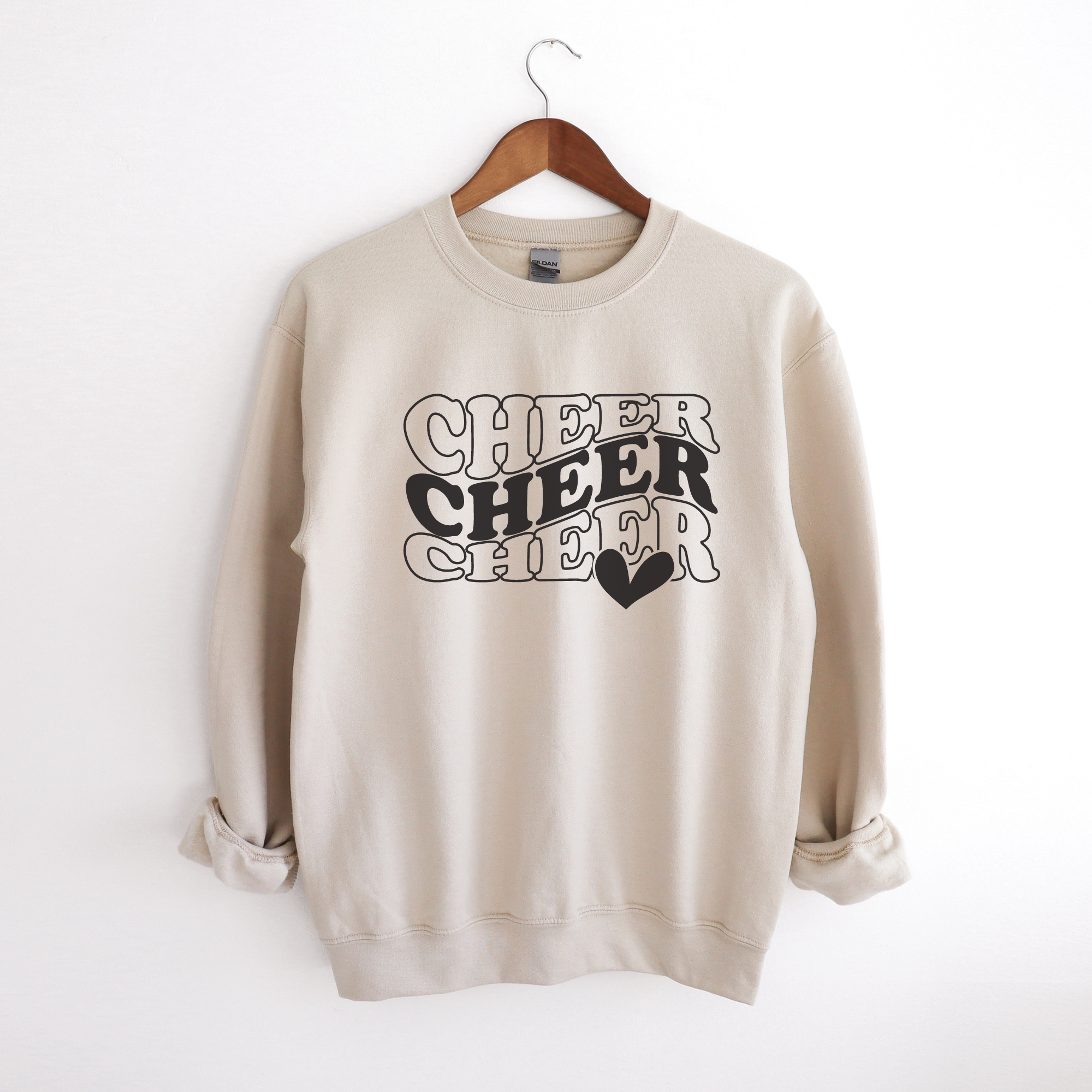 Sand Cheer sweatshirt in in a wavy stacked text with a heart.