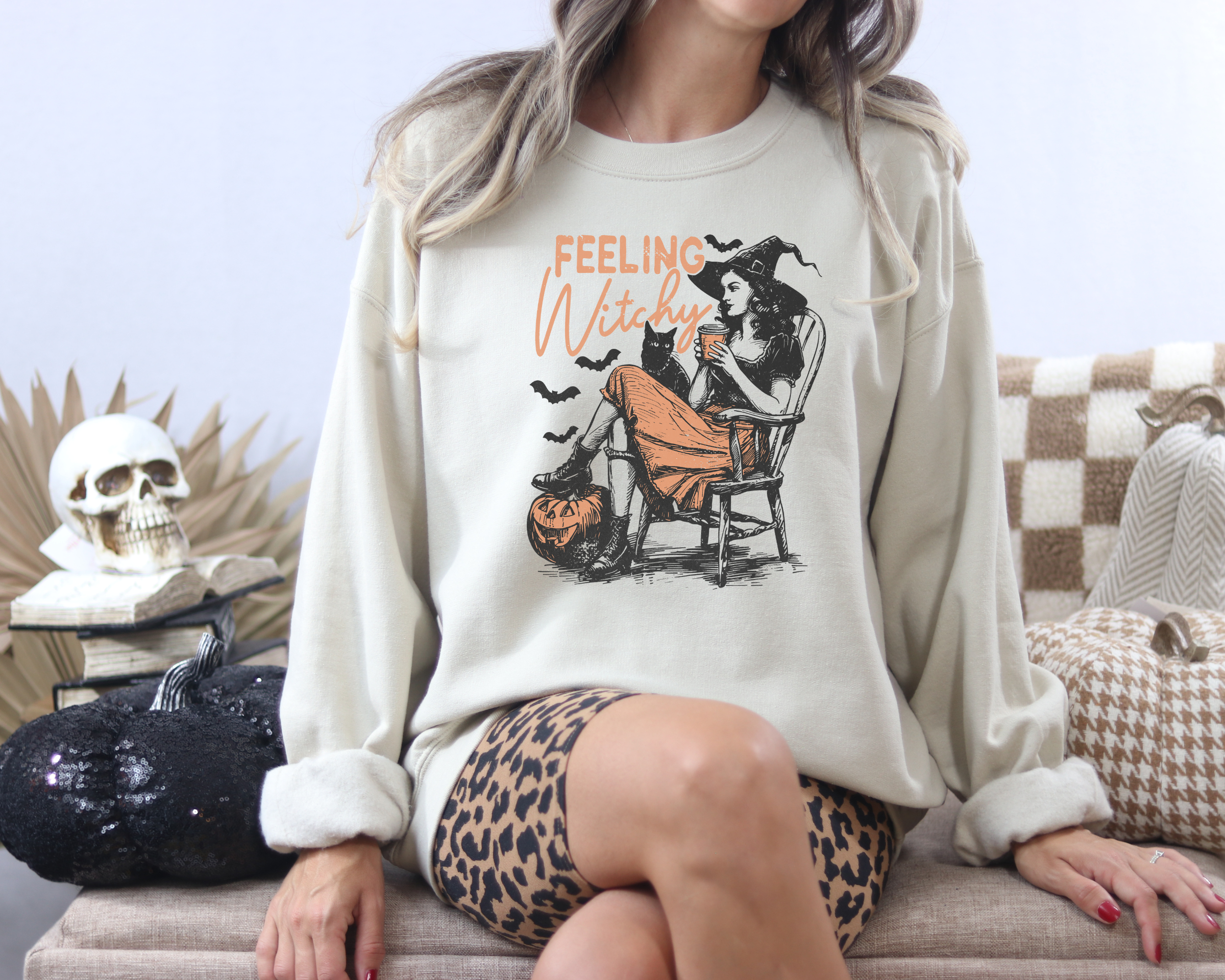 Feeling witchy vintage inspired women's halloween sweatshirt in the color sand.