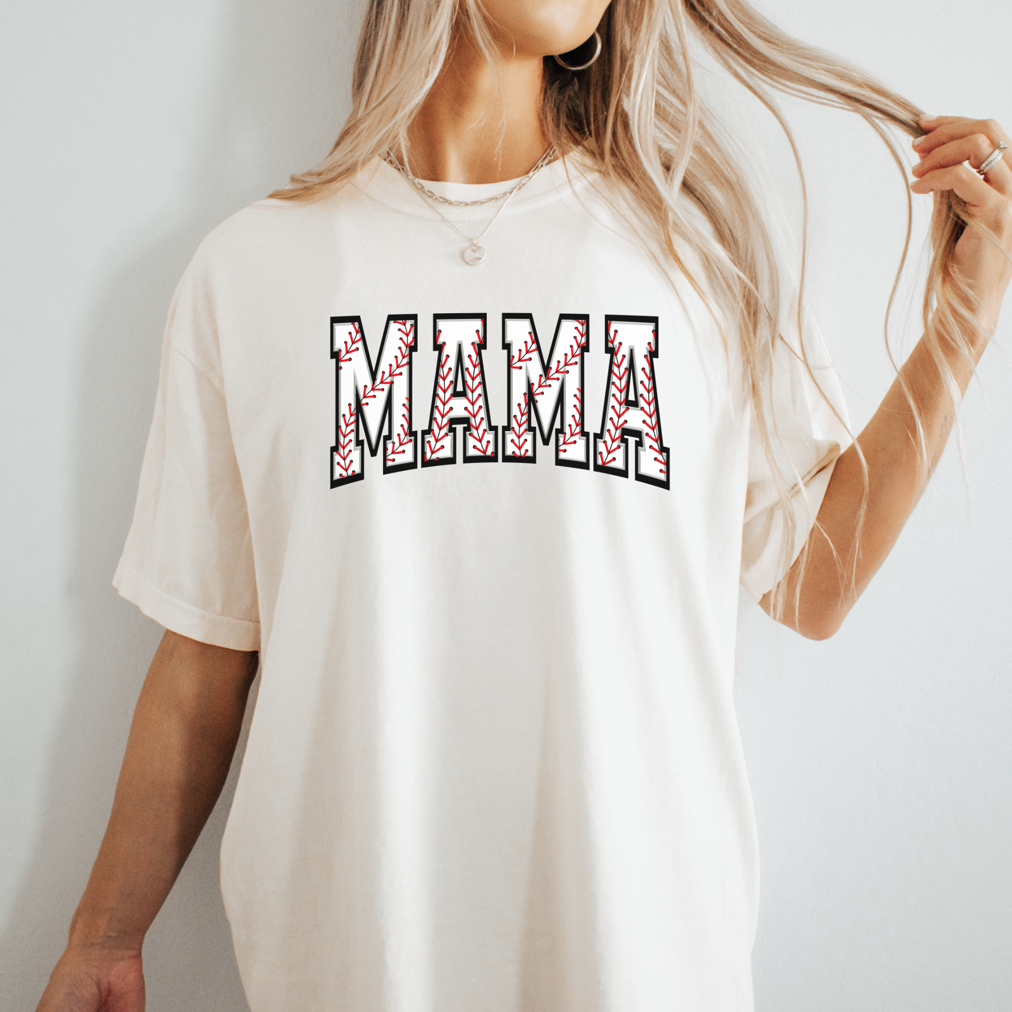 baseball mom shirt that says baseball mama in a baseball print design.
