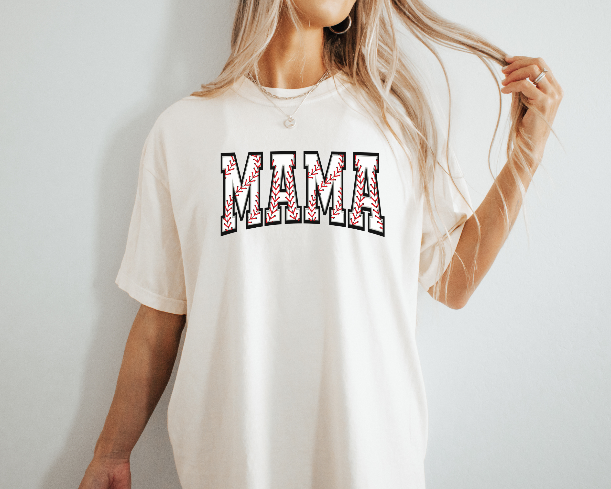 baseball mom shirt that says baseball mama in a baseball print design.