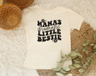 Kids graphic tee that says mamas dramatic little bestie in  natural with a black design