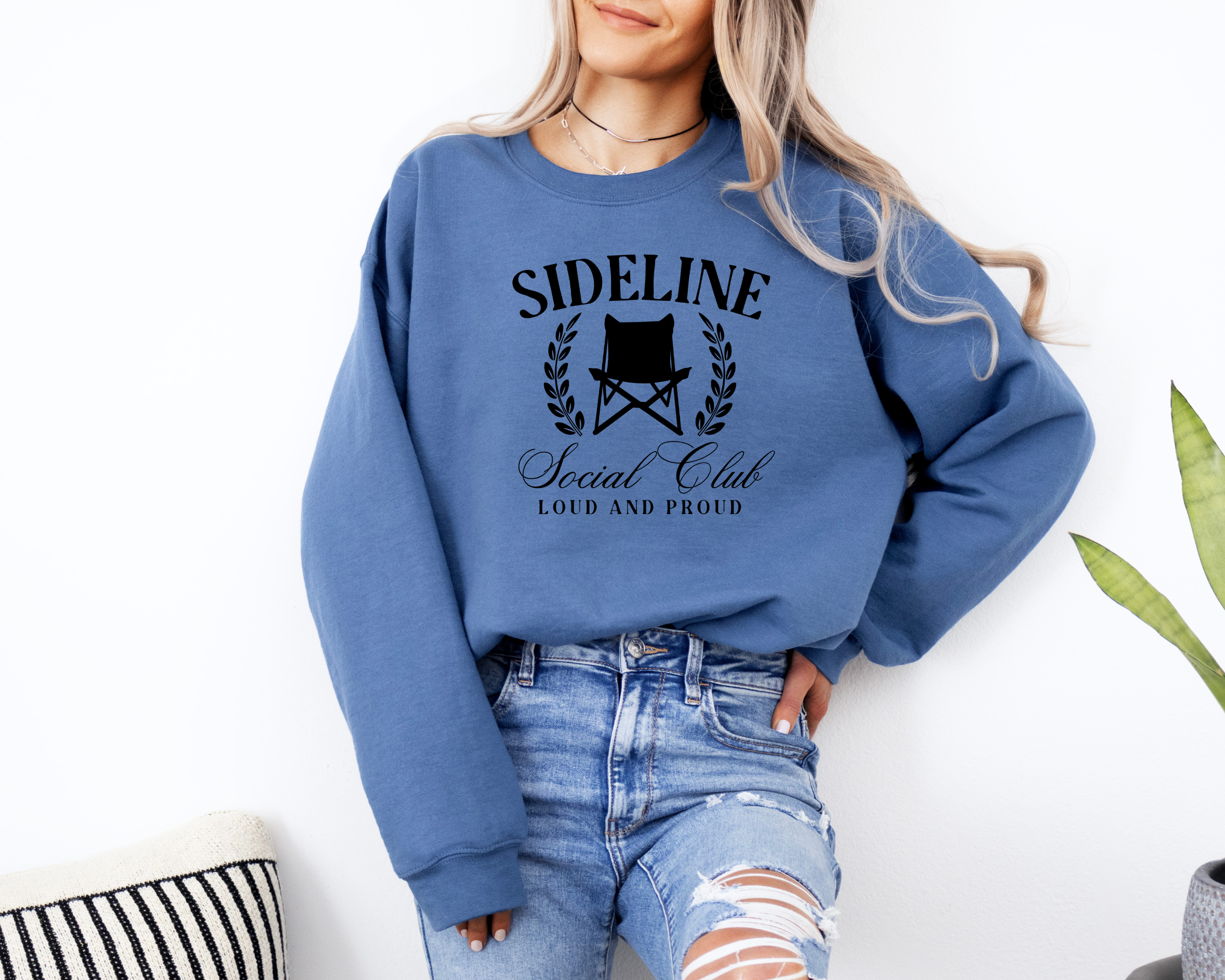 sports mom sweatshirt that says sideline social club loud and proud.