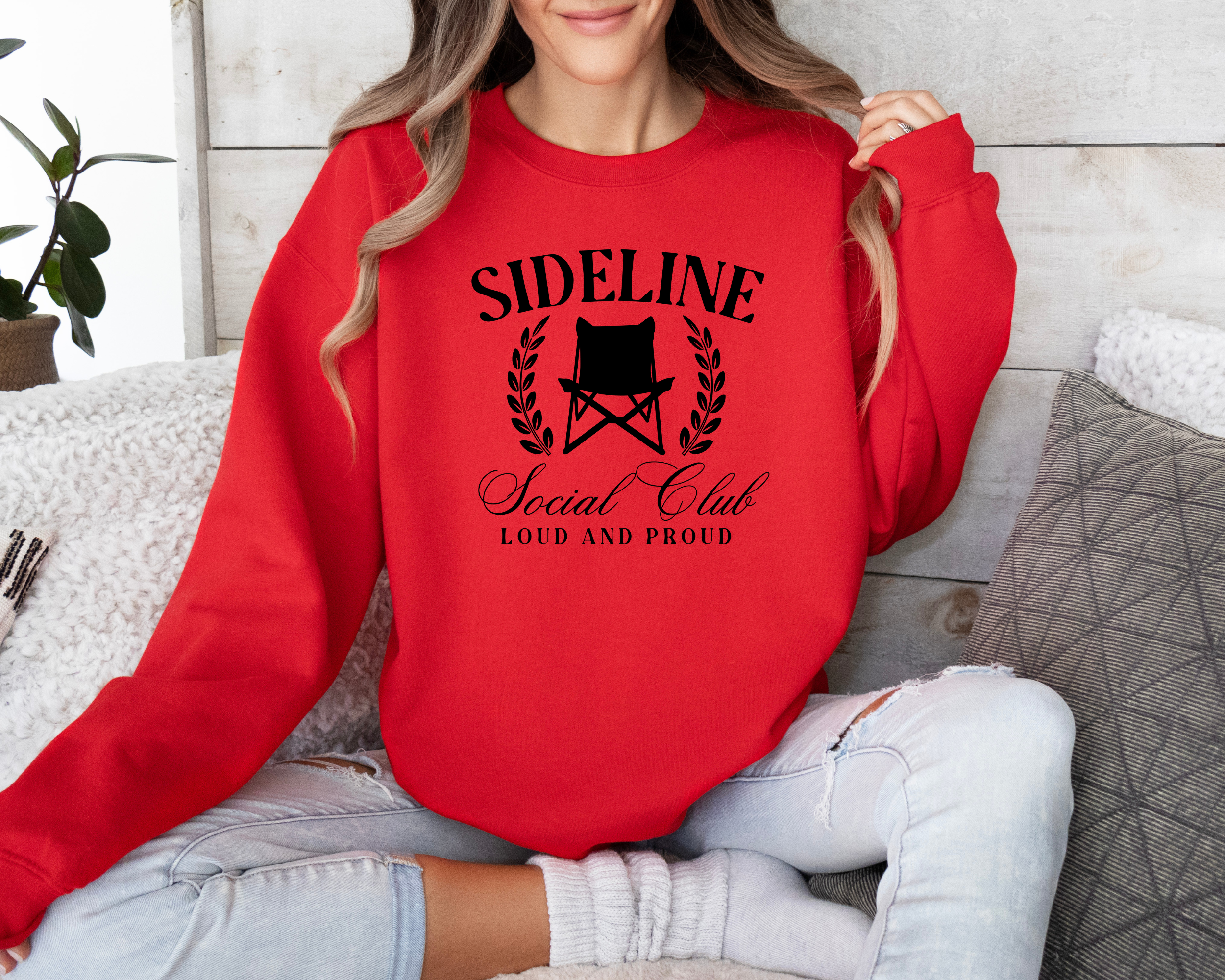 sports mom sweatshirt that says sideline social club loud and proud.