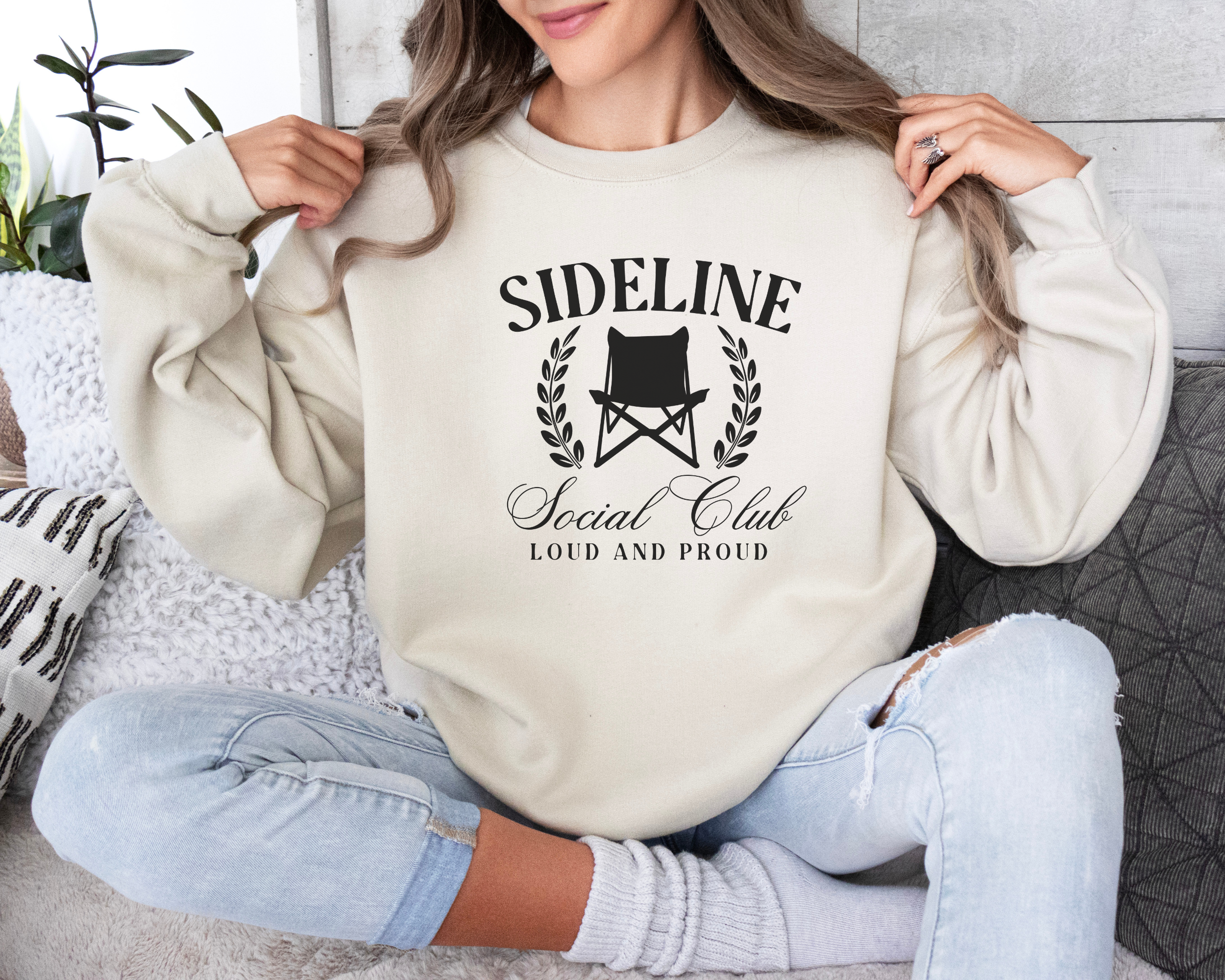 sports mom sweatshirt that says sideline social club loud and proud.