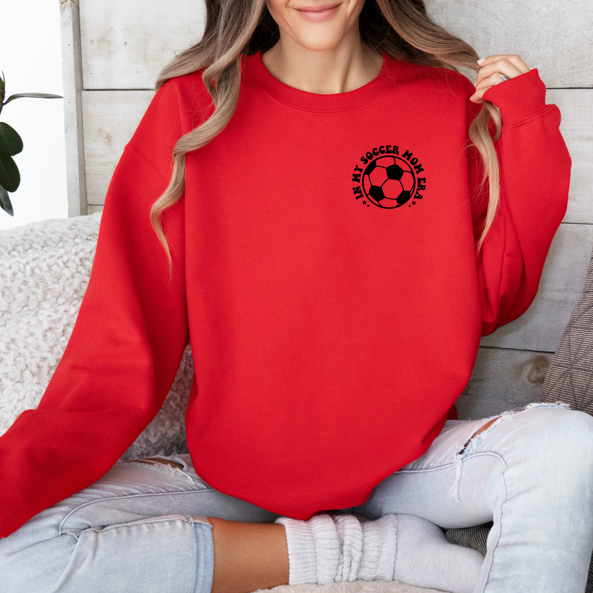 In my soccer mom era. Soccer mom sweatshirt in red.