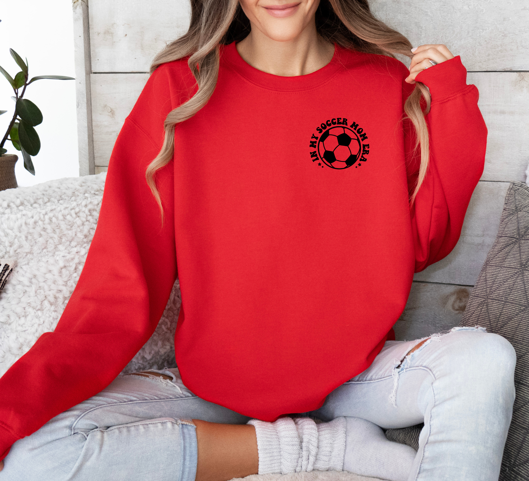 In my soccer mom era. Soccer mom sweatshirt in red.