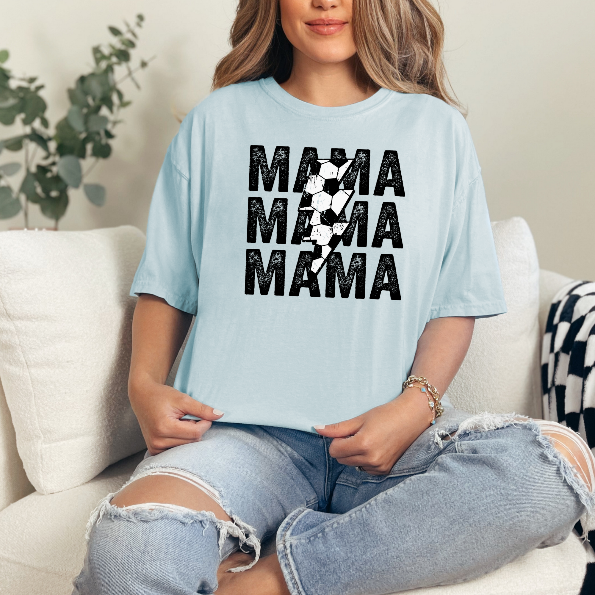 soccer mom tshirt that says soccer mama with a distressed soccer lightening bolt.