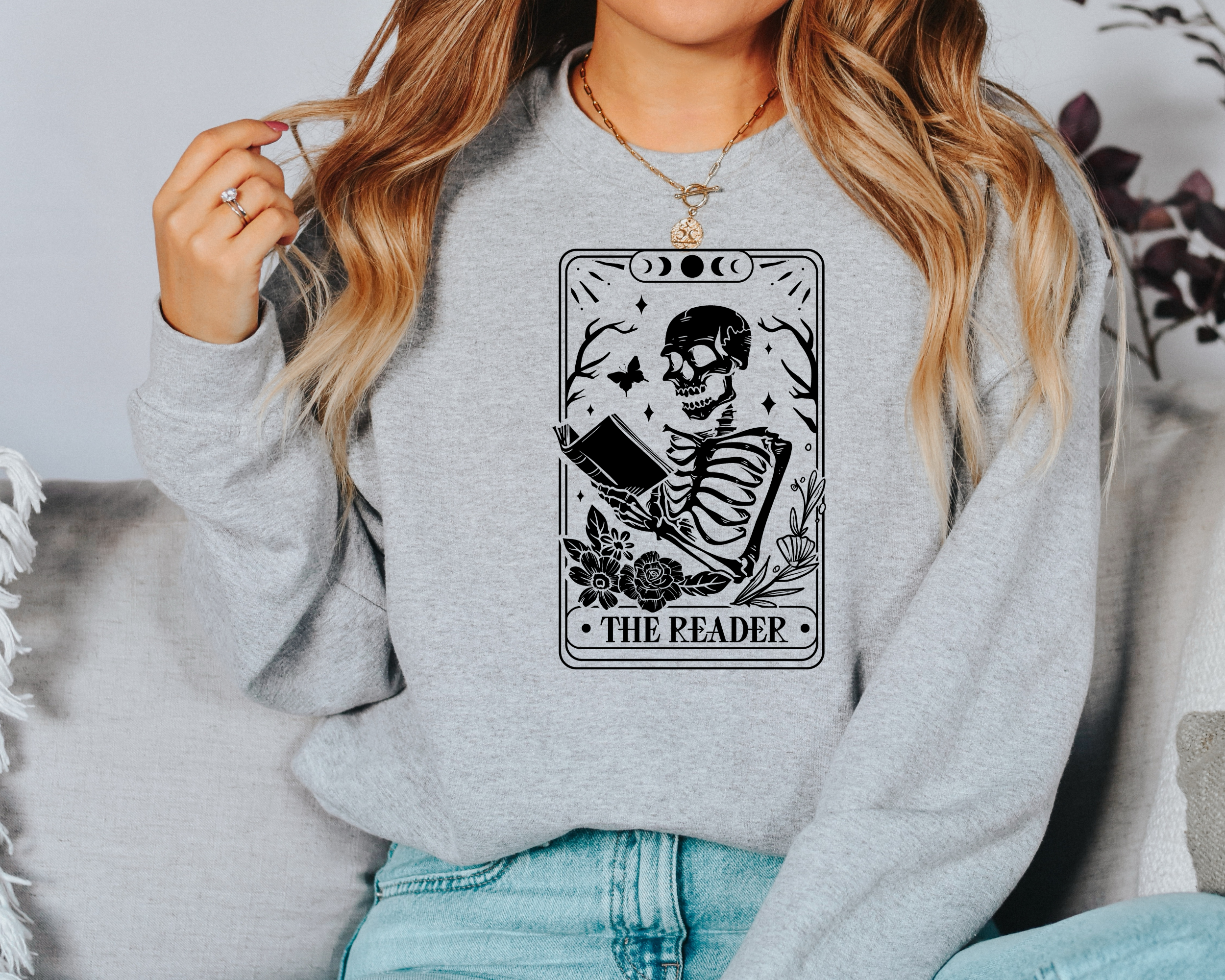 Book lover sweatshirt that features a tarot card that says the reader.  Women's sweatshirt.