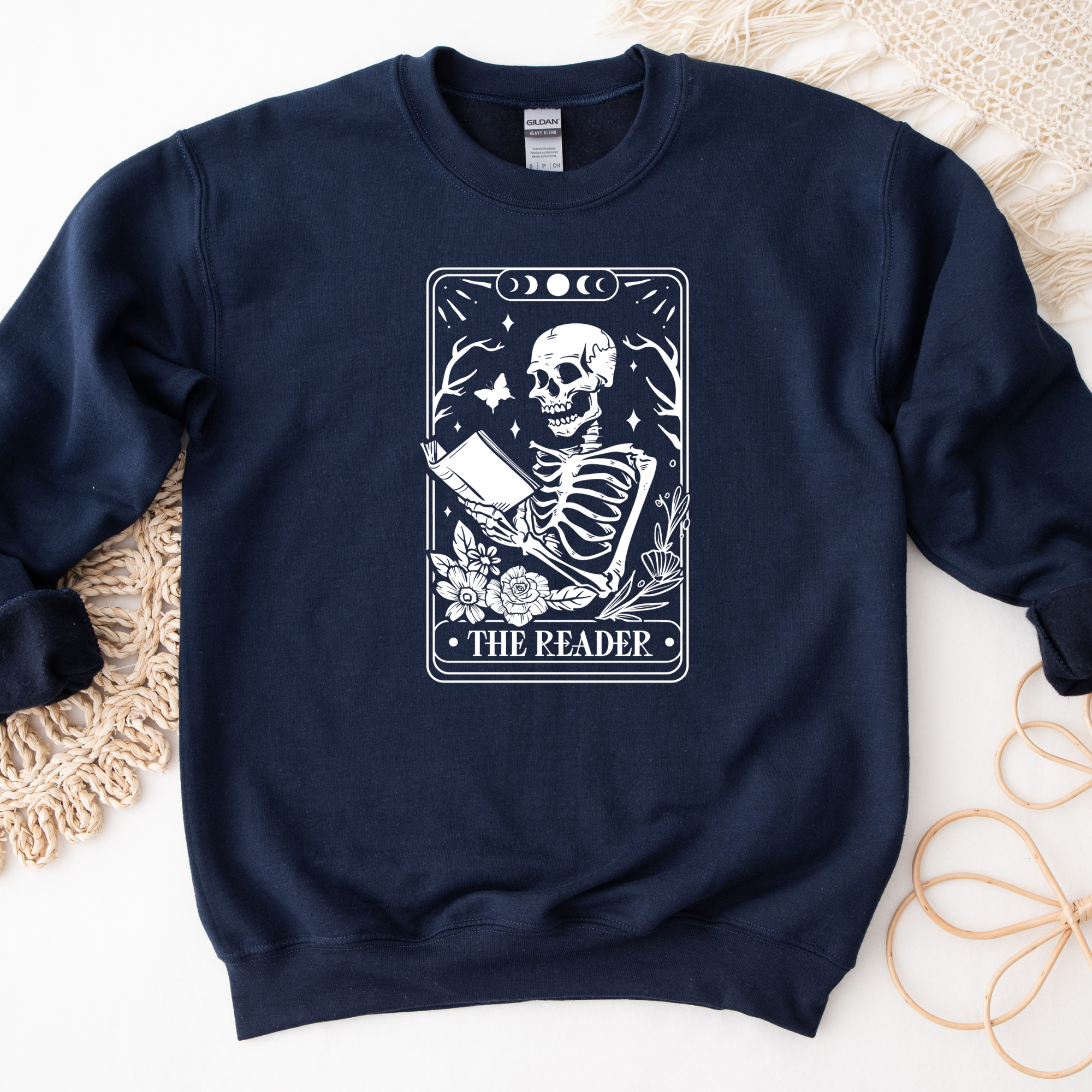 Book lover sweatshirt that features a tarot card that says the reader.  Women's sweatshirt.