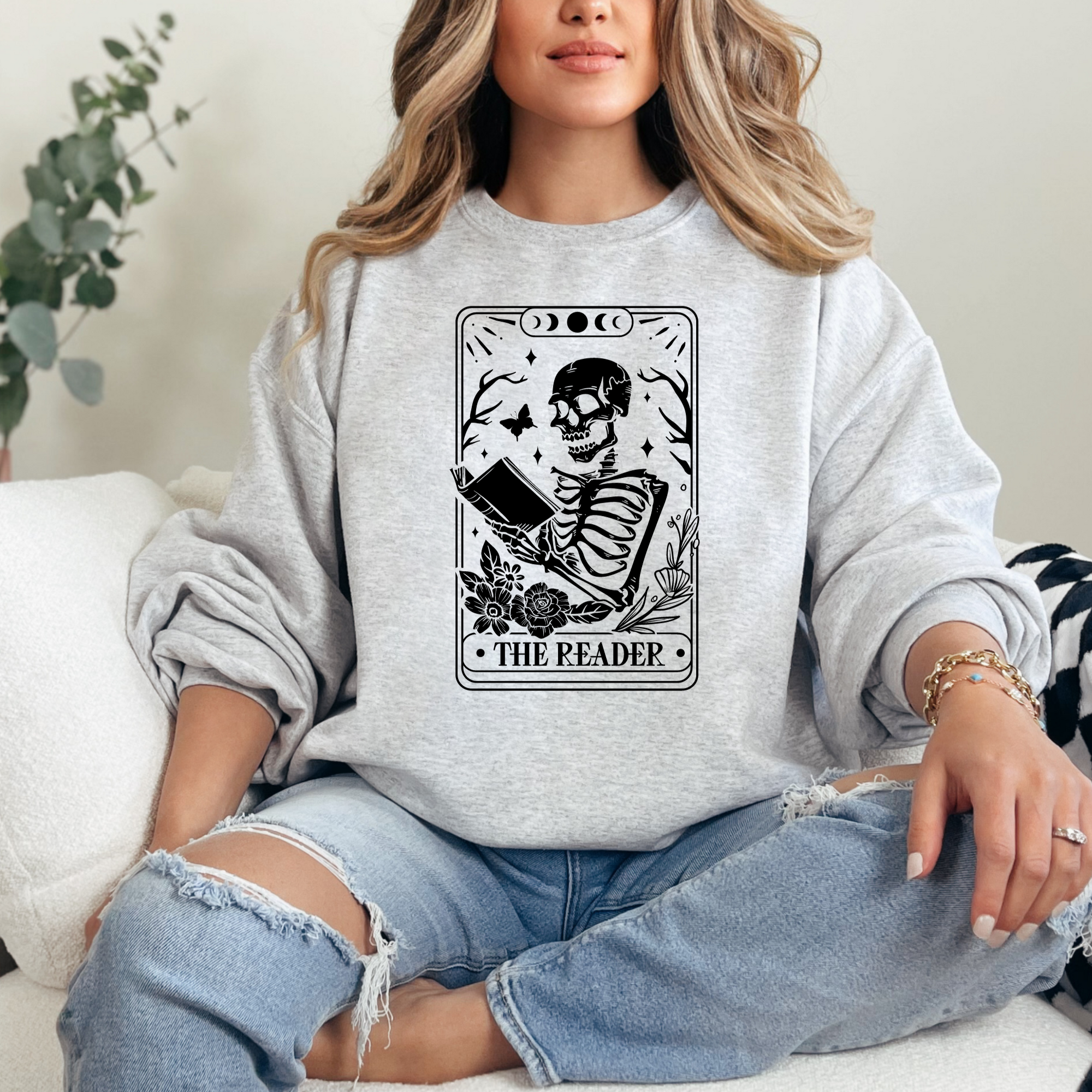 Book lover sweatshirt that features a tarot card that says the reader.  Women's sweatshirt.