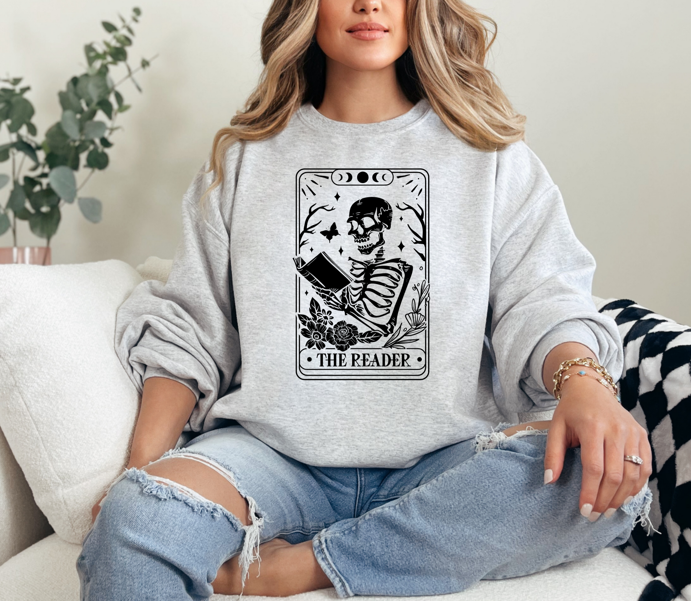 Book lover sweatshirt that features a tarot card that says the reader.  Women's sweatshirt.