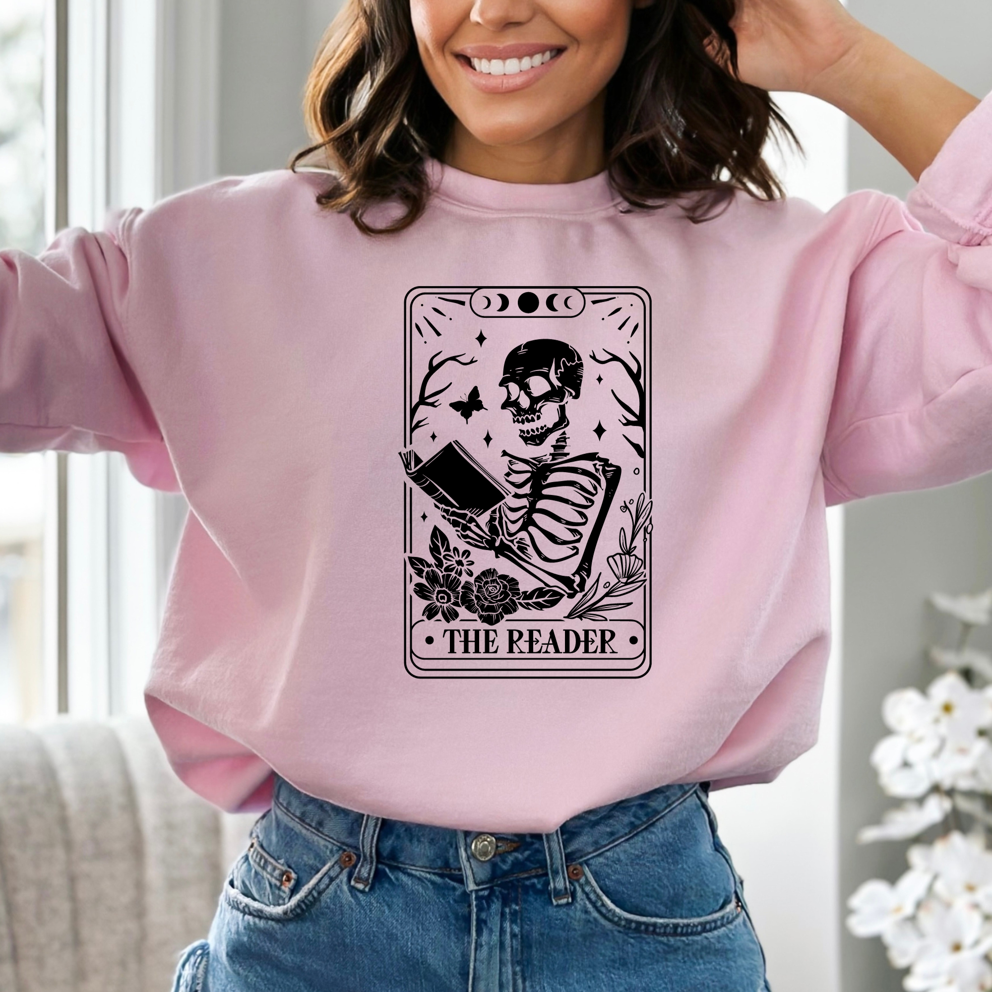 Book lover sweatshirt that features a tarot card that says the reader.  Women's sweatshirt.