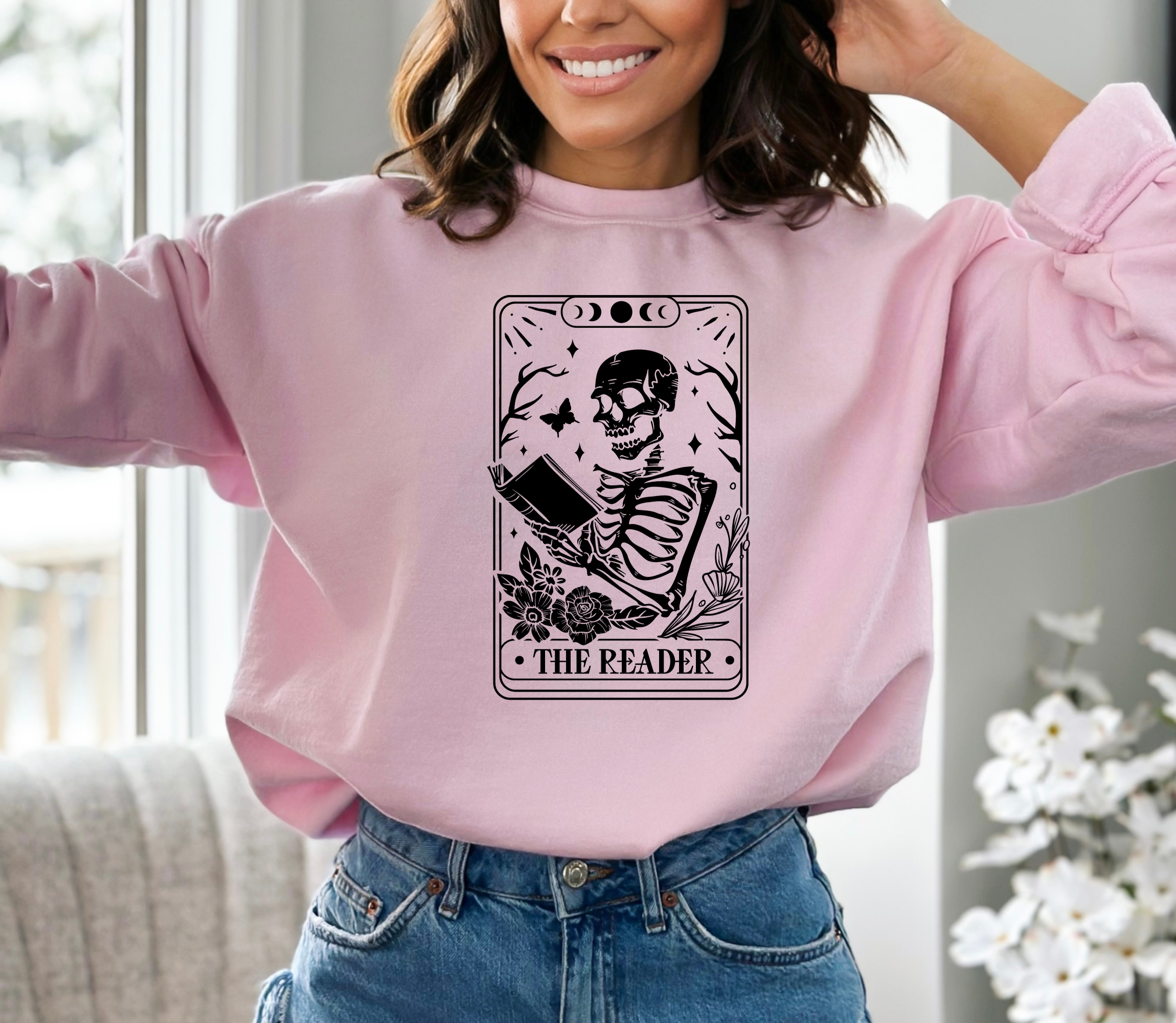 Book lover sweatshirt that features a tarot card that says the reader.  Women's sweatshirt.