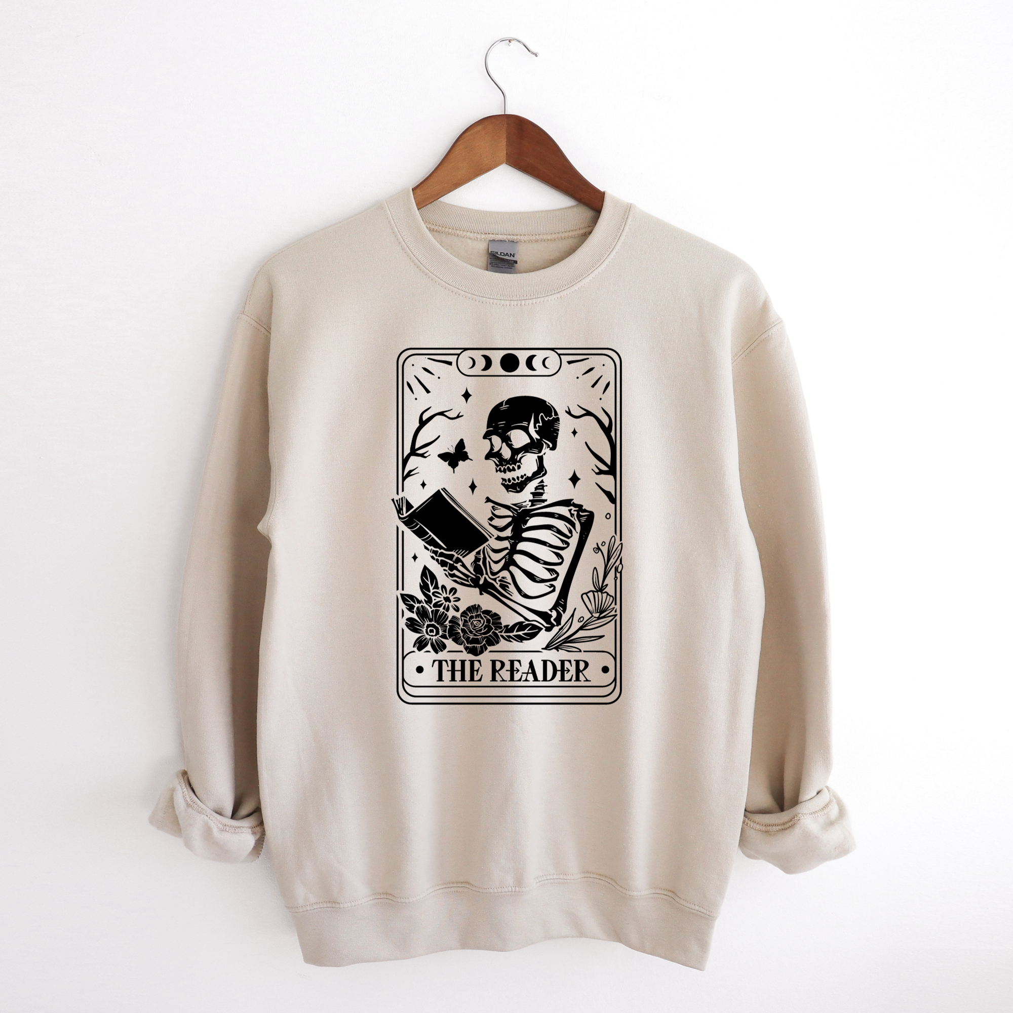 Book lover sweatshirt that features a tarot card that says the reader.  Women's sweatshirt.
