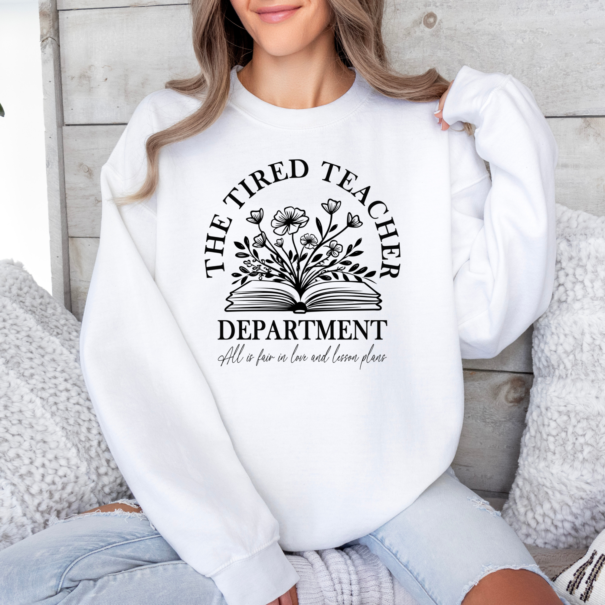 The tired teachers department sweatshirt