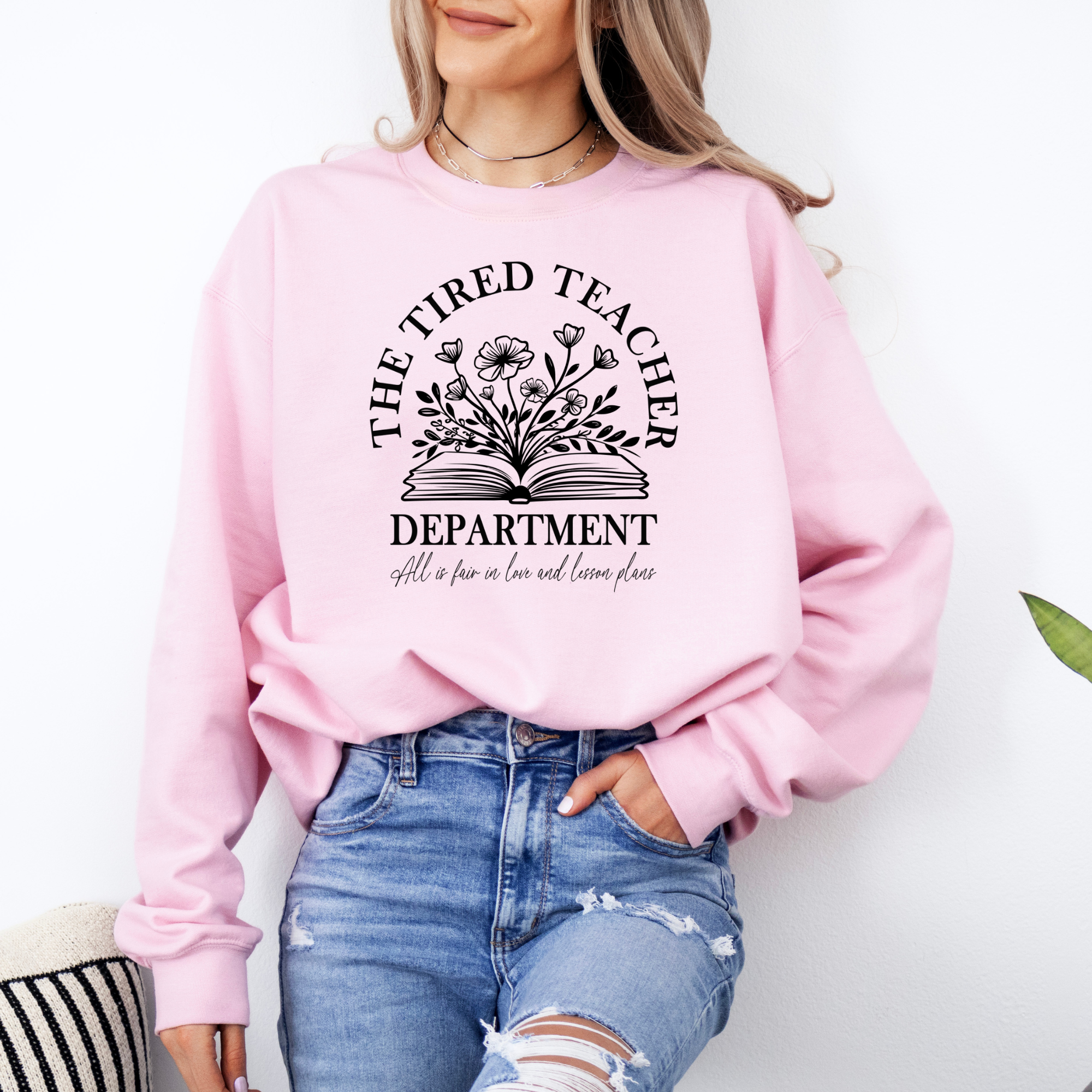 The tired teachers department sweatshirt