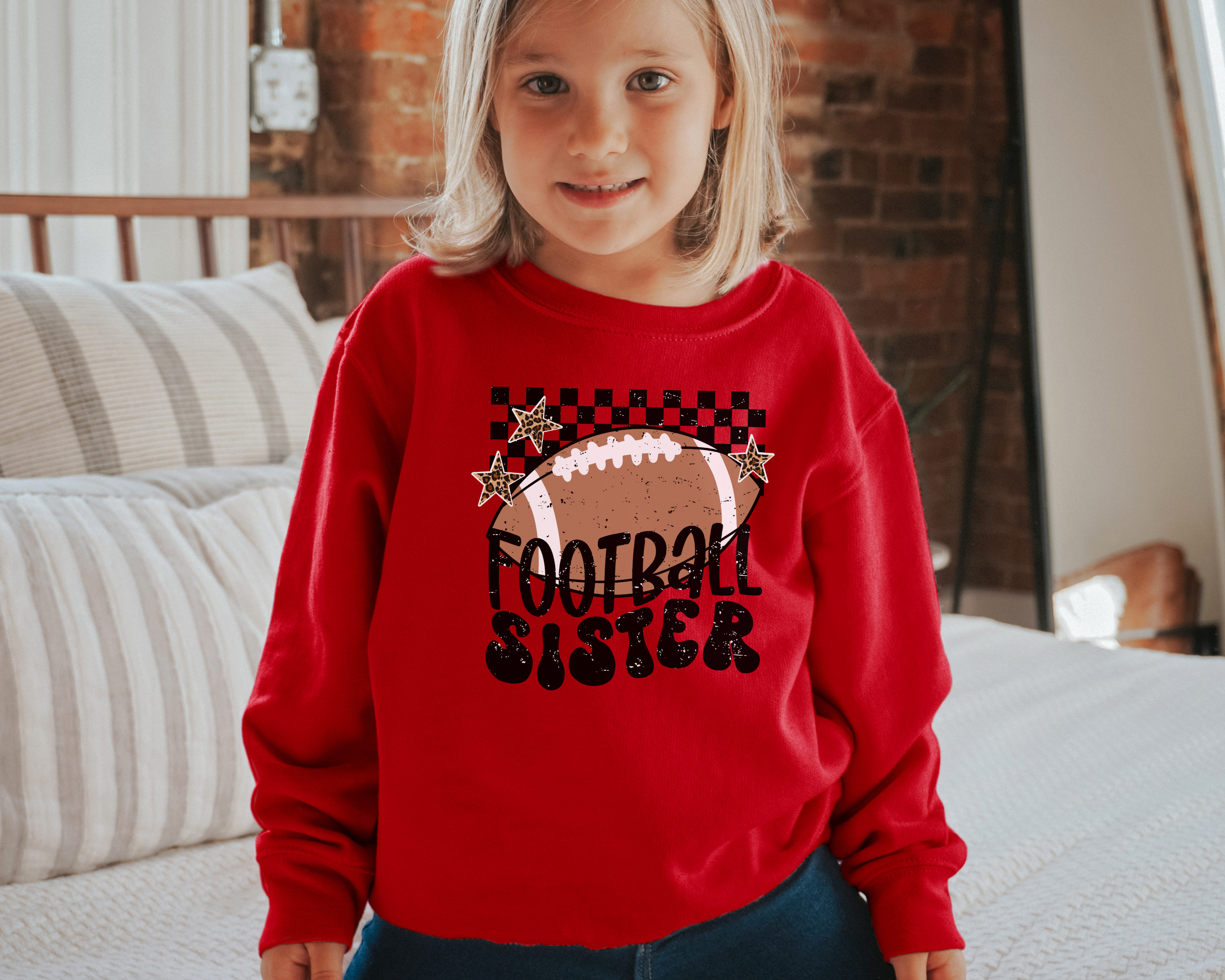Football sister sweatshirt with a trendy retro and distressed design