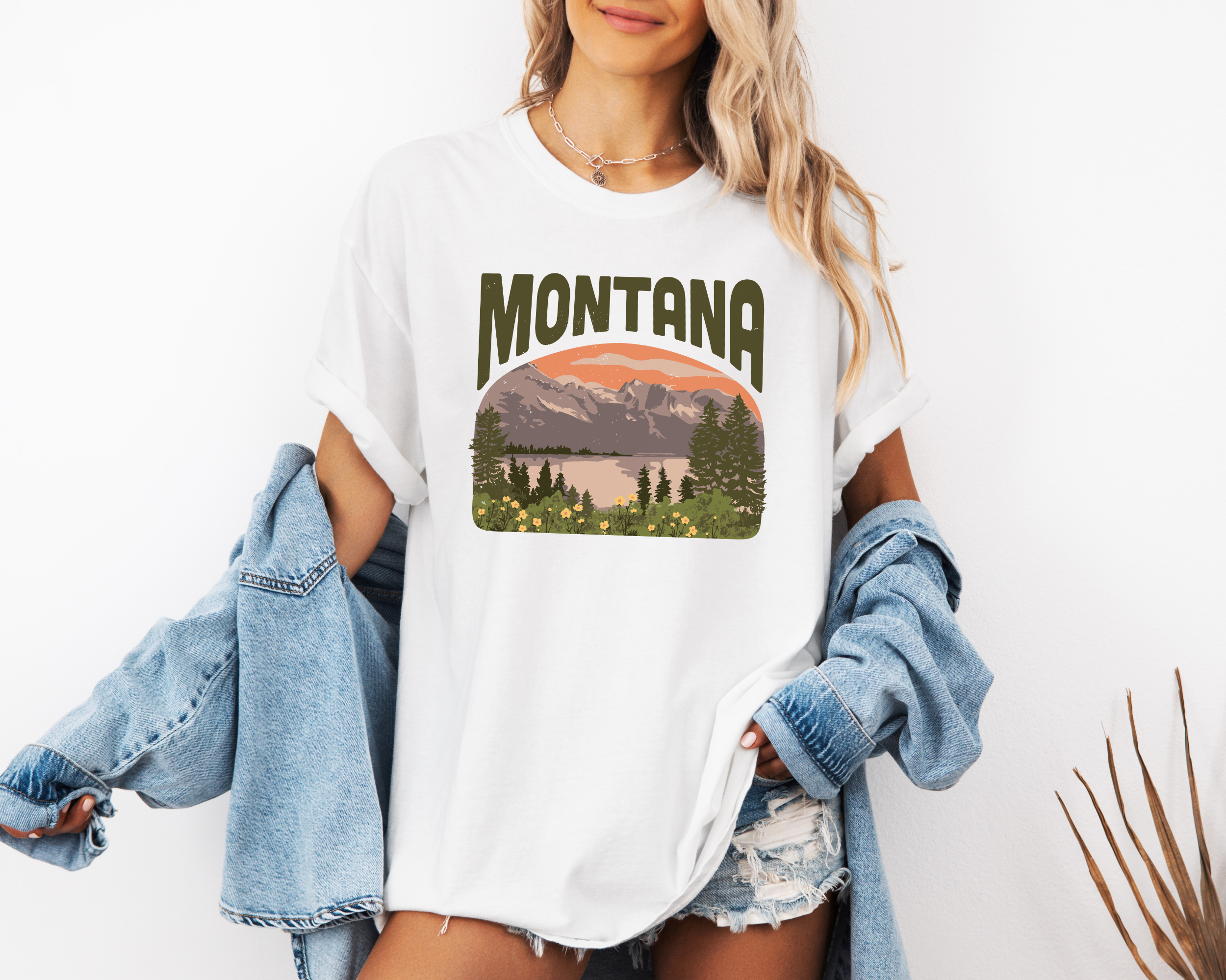 Montana tshirt with a scene of mountains and a lake.  Unisex graphic tee in white.