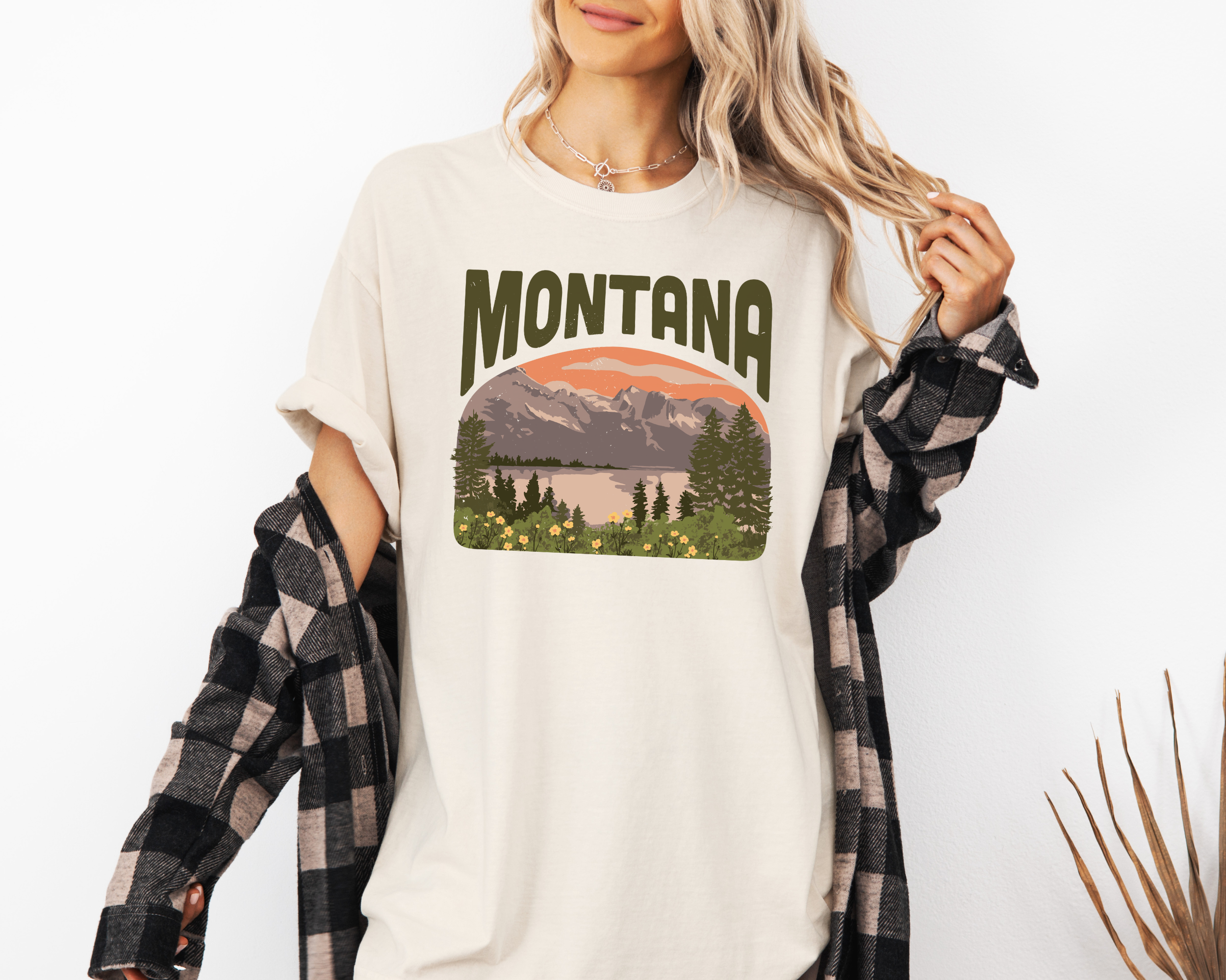 Montana tshirt with a scene of mountains and a lake.  Unisex graphic tee in ivory
