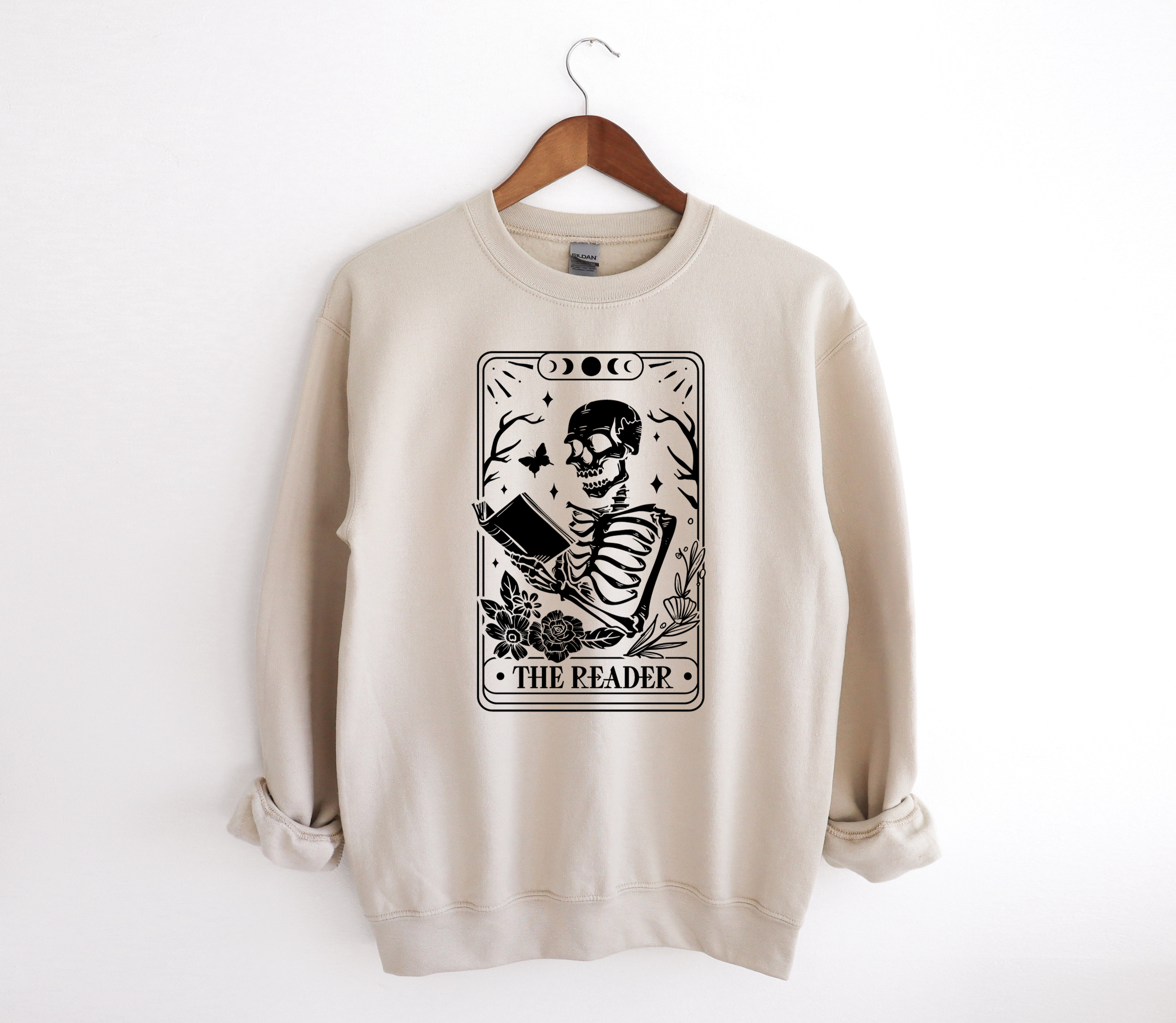 Book lover sweatshirt that features a tarot card that says the reader.  Women's sweatshirt. 
