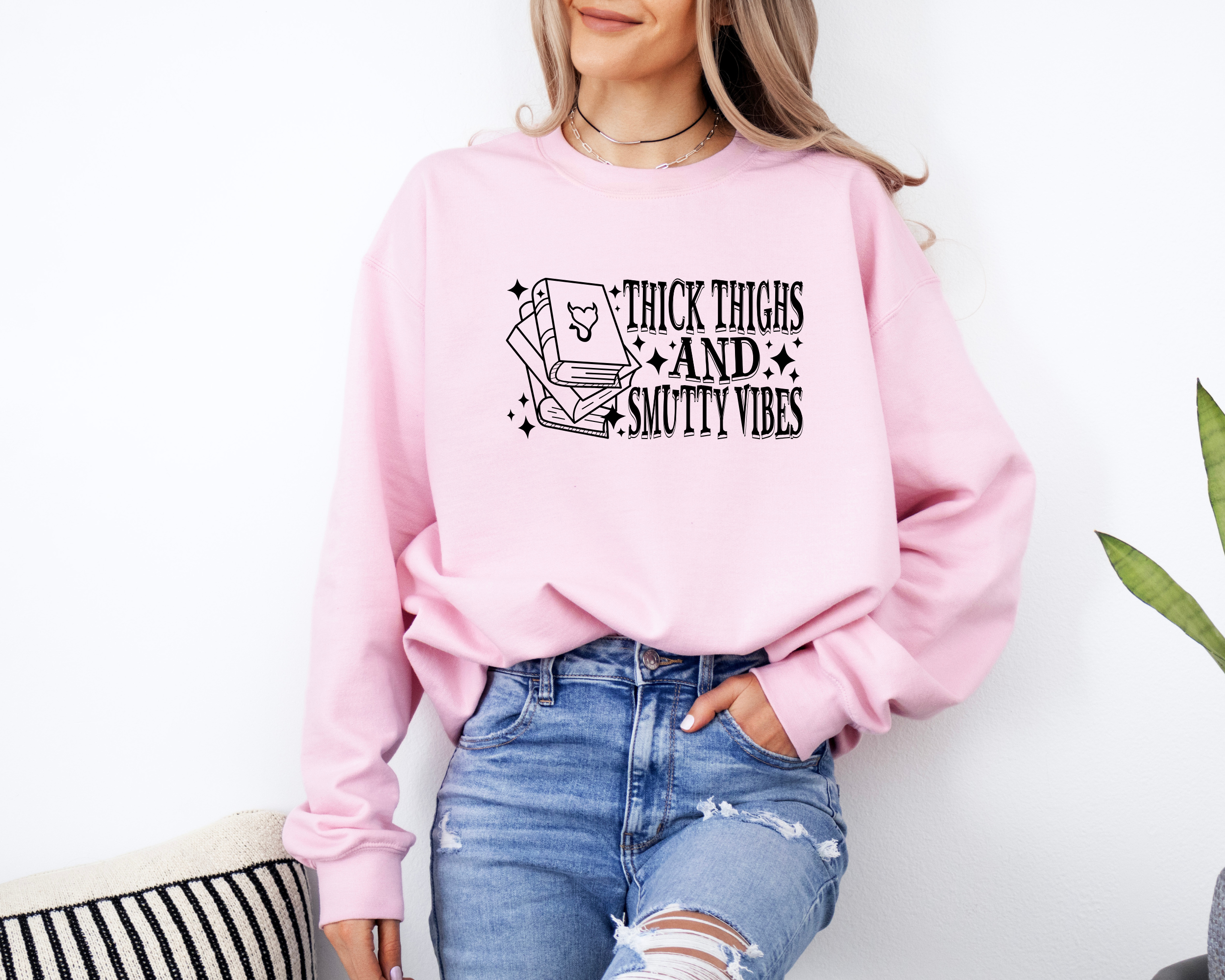 book lover sweatshirt that says thick thighs and smutty vibes
